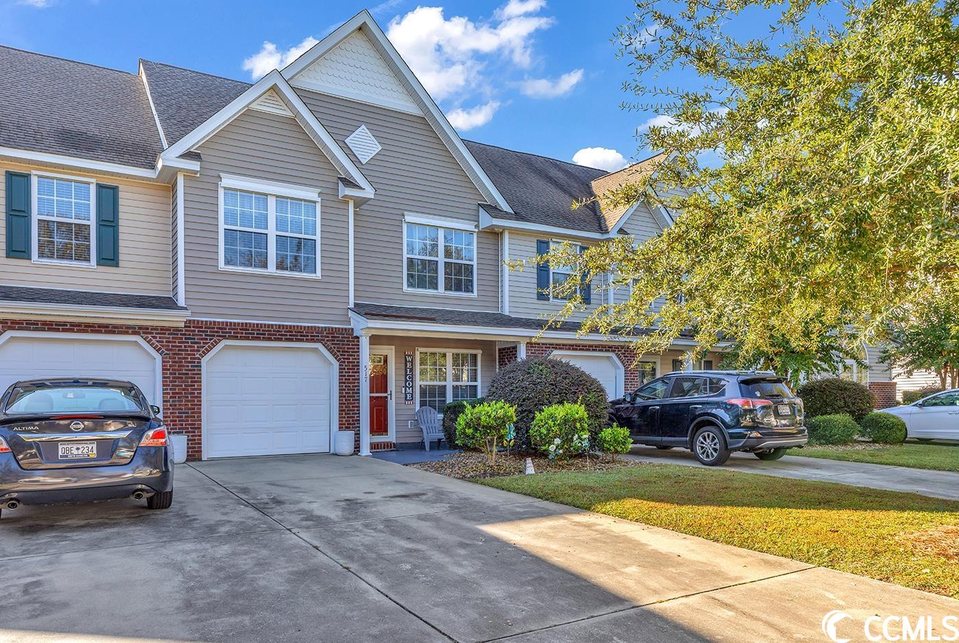 welcome to your dream home in the sought-after sawgrass east community in carolina forest. this fully furnished stunning 3-bedroom, 2.5-bath townhouse offers the perfect blend of style, comfort, and convenience. with a range of exceptional features, this property is a true gem you won't want to miss. this unit has one of the few built-in wood burning fireplaces with an elegant faux stone surround, creating a warm and inviting atmosphere in the living area.  enjoy the outdoors year-round in the comfort of your screened-in back porch, a perfect spot for relaxing or entertaining. the bathrooms are adorned with beautiful marble flooring, adding a touch of sophistication and luxury to your daily routine. the primary bedroom features a vaulted ceiling and a custom tile shower in the on-suite bathroom, showcasing exquisite craftsmanship and providing a unique, stylish touch. this townhouse offers plenty of storage options, including under stairs storage and additional built-in storage in the garage, keeping your home clutter-free and organized. the hvac system is less than a year old, ensuring you have efficient and reliable climate control. the kitchen is a chef's delight with granite countertops and painted cabinets that perfectly complement each other, creating a cohesive and contemporary look. this townhouse is not just a home; it's a lifestyle. the sawgrass east community offers a host of amenities and is located in the highly desirable carolina forest area, known for its top-rated schools, shopping, dining, and proximity to the beautiful myrtle beach. don't miss the opportunity to make this remarkable townhouse your new home. schedule a showing today and discover the comfort and elegance that await you in sawgrass east. your dream home is here, and it won't last long! square footage is approximate and not guaranteed. buyer responsible for verification.
