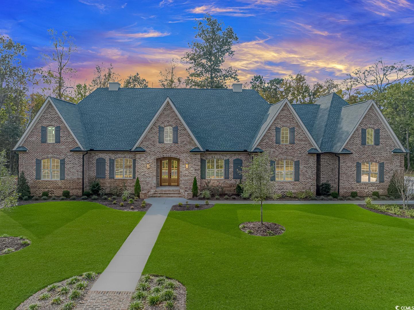 luxury at it's very finest for the distinguished home buyer. this custom built show-stopping all brick 6 bedroom 5 bath 5100+ heated square foot home is located on nearly an acre lot in the beautiful prestigious gated golf community of dye estates in barefoot resort. incredible curb appeal includes custom landscaping, oakton brick, arched shutters and gas lanterns on either side of the front door. enter through the beautiful mahogany arched door into the grand foyer with 14 ft trayed ceiling. note the arch design that carries from the exterior front through the interior to the back of the house. formal dining room includes custom wainscoting and 12 ft trayed ceiling. open floor plan family room/kitchen features gorgeous light oak flooring, & a stunning gas fireplace flanked by custom cabinetry that creates a nice balance with the gorgeous brick enclosure for the stove in the kitchen on the opposite end of this massive room. beautiful cedar beam design wood work runs the entire length of the 12 ft ceilings in this space & showcases a stunning black iron chandelier & matching light fixtures. a central space in the room allows for dining for 10-12. gourmet kitchen includes a 48 inch 8  burner gas range with pot-filler and double oven & a hidden range hood behind the brick enclosure. kitchen showcases high end 10 ft soft gray cabinets with lighted display glass at the top. columns frame the refrigerator/freezer. double dishwashers--one on either side of the sink under a large window overlooking the backyard. huge island topped with beautiful quartz countertops and lots of storage space underneath.  the cedar beam design continues throughout the 12 foot ceilings in this space. flooring is light oak. just off the kitchen is an incredibly practical butler’s pantry that includes more custom cabinetry along with spacious counter-tops & sink for food prep. wooden shelves provide additional storage.  down the hallway is a large storage space with herringbone brick floor that could serve as a wine cellar or additional storage space.on the left side of the home are three large bedrooms with 18 ft vaulted ceilings with cedar beams, custom accent walls, and built in desks with wall lamps & internet hookup. the front two bedrooms share a bath with quartz countertop and a tub/shower with beautiful surround tile to the ceiling. the 3rd bedroom has a private onsuite bath. headed down the hallway to the other end of the house is another bedroom with accent wall, arched windows & huge walk in closet. connecting bath is also accessible from the hallway & features quartz countertop & tile. next door you’ll find the office with a hidden spiral staircase in the closet that leads to a surprise flex space that could be a bourbon, cigar or gun room, or your choice. around the corner is the large laundry room with herringbone brick floor, lots of storage & counter space as well as a gas line option for dryer. the huge master bedroom is jaw-dropping with a 22 ft ceiling accented by a cedar beam & direct access to a large back porch. master bath is dreamy with a huge tiled shower w/glass doors & corner bench. the luxury continues with a modern free standing double slipper tub for those relaxing bubble baths. plentiful cabinets. two master closets-the larger one is a whopping 11x16 & includes a large island with storage. upstairs you’ll find a large bonus room, additional bedroom/bath & a massive attic storage space. huge back porch with beautiful knotted pine ceiling with clear coat.  porch includes cable hookup to add a tv. hard connection on back of house for future pool equipment &propane line for a future outdoor kitchen. large three car garage with extended driveway. drop zone entering home has herringbone brick flooring. home includes 3 electric hvac units for a total of 10 tons and 2 gas rinnai water heaters. community amenities include use of oceanfront beach cabana. located central to all the grand strand has to offer. call for your showing!
