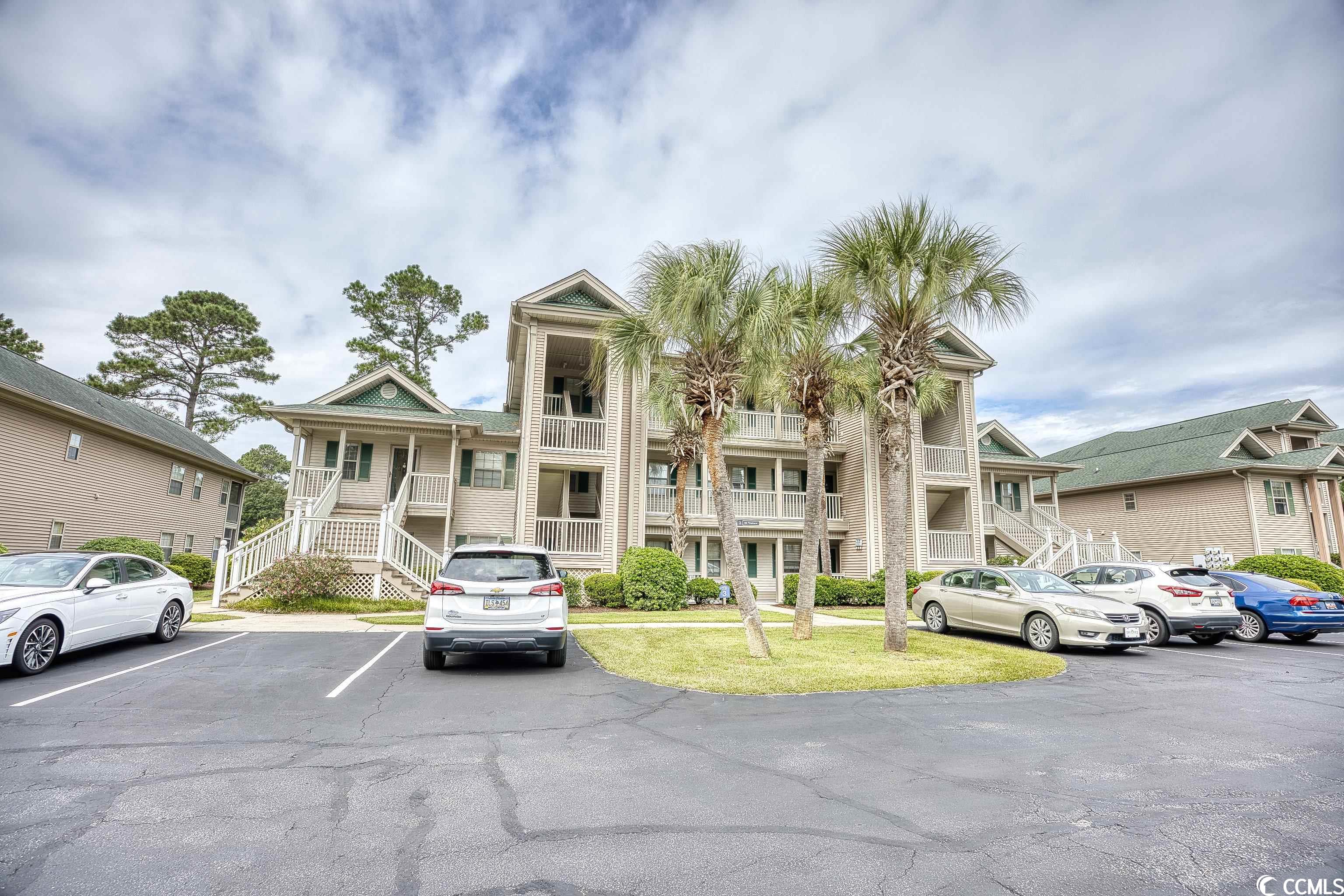 first floor 2br condo in desirable true blue golf community now available. great pond/golf course view from owner's suite and back screened porch in this end unit.  updated counters in kitchen, newer carpet in bedrooms and lvp in all other areas.  perfect spot for low maintenance primary residence, part-time golf and beach escape or rental property as both short and long term rentals are allowed.  community pools and tennis/pickleball courts are included in your hoa fee.  don't miss out - call now to schedule your showing !