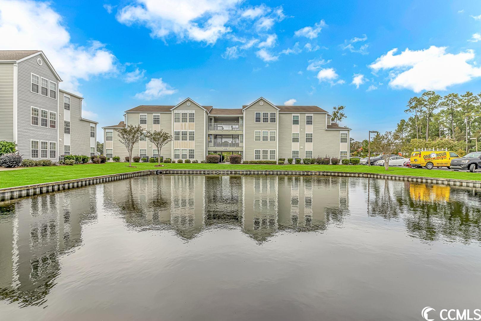 welcome to this 2 bedroom, 2 bathroom southbridge condo in the heart of surfside beach! this top-floor unit offers a perfect blend of coastal comfort and convenient living. with its prime location, spacious interior, and a host of desirable features, this condo is sure to capture your heart. as you step inside, you'll immediately be impressed by the soaring vaulted ceilings in the living room, which create an open and airy atmosphere. natural light pours in through large windows, bathing the space in warmth and radiance. the living room seamlessly flows into the carolina room, where you can relax and unwind while enjoying panoramic views of the serene pond below. the master bedroom is a true retreat, boasting a generous walk-in closet for all your storage needs. the en suite bathroom is complete with a convenient tub/shower combo, making it perfect for both relaxation and practicality. the spacious guest room is a welcoming haven for visiting company, offering them access to the well-appointed guest bathroom. privacy and comfort are top priorities in this thoughtfully designed condo. additional features include a convenient laundry/utility closet, ensuring your daily chores are a breeze. with this condo, you can truly enjoy the laid-back beach lifestyle without the hassle. outside, the condo overlooks a picturesque pond, providing a tranquil backdrop for your morning coffee or evening relaxation. the community offers a wealth of amenities, including outdoor pools, recreation centers, and sidewalks for strolls in the beautiful surroundings. don't forget to keep an eye out for turtles while enjoying the view! situated between us 17 business and us 17 bypass, you're just a short drive away from the pristine beaches of surfside beach, where sun and surf await. local eateries, shopping, dining, and area attractions are all within easy reach, ensuring you'll never run out of things to do and explore. don't miss this incredible opportunity to own a piece of paradise in surfside beach. schedule your viewing today and make this condo your own coastal retreat! square footage is approximate and not guaranteed. buyer is responsible for verification.
