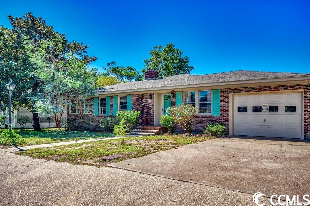 well maintained 2 bedroom, 2 bath, single level home on a lake lot and just a short walk to the beach. located east of hwy 17 in the crescent beach section of north myrtle beach, this beach rancher combines the best of old beach charm with modern conveniences and is being sold fully furnished!  with no hoa or hoa fees you have less restrictions and are allowed short-term and long-term rentals, motorcycles, golf carts, fencing, pool and much more. the attached garage will accommodate 2 cars (tandem) and has a garage door in both the front and the back for extra convenience. inside you will find ¾” tongue-in-groove hardwood floors in foyer, hallways, family room and both bedrooms. these floors are the ones you can refinish multiple times. the eat-in kitchen has updated tall white wood cabinets, granite counter tops with a textured “fire-etched” surface, undermount sink, tile backsplash, pantry, 4 recessed lights, and white appliances. the living room boasts a new ceiling fan, a cozy wood burning fireplace, built-in cabinets and shelving, and a sofa sleeper. the 2 bedrooms are nice sizes, one with 3 twin beds and an ensuite bathroom with a shower, updated vanity and toilet. the other bedroom has two closets and both a queen bed and twin bed. the hall guest bathroom has an updated toilet and a tub/shower combination. the large 22’x10’ (approx) carolina room has a new ceiling fan, sofa sleeper and could easily be a 3rd bedroom. home sleeps up to 10 people. the kitchen and both bedrooms have painted knotty pine walls and ceilings while the carolina room is still unpainted, natural knotty pine. heating and air unit was replaced mid-2023. roof was installed in 2007. washer, dryer and mud sink are located in the garage. enjoy entertaining or just relaxing while looking at the beautiful lake in backyard. the lot extends into the lake a bit. ask your agent for the survey. the backyard also includes an outdoor shower and an attached storage shed. you get all this with no hoa or hoa fee. enjoy all north myrtle beach has to offer with lots of shopping, entertainment, shagging dance clubs and barefoot landing and tanger outlet nearby….and don’t forget the sandy beaches of the atlantic ocean just steps away. contact us today to schedule a showing and make 407 14th ave s your new beach retreat!