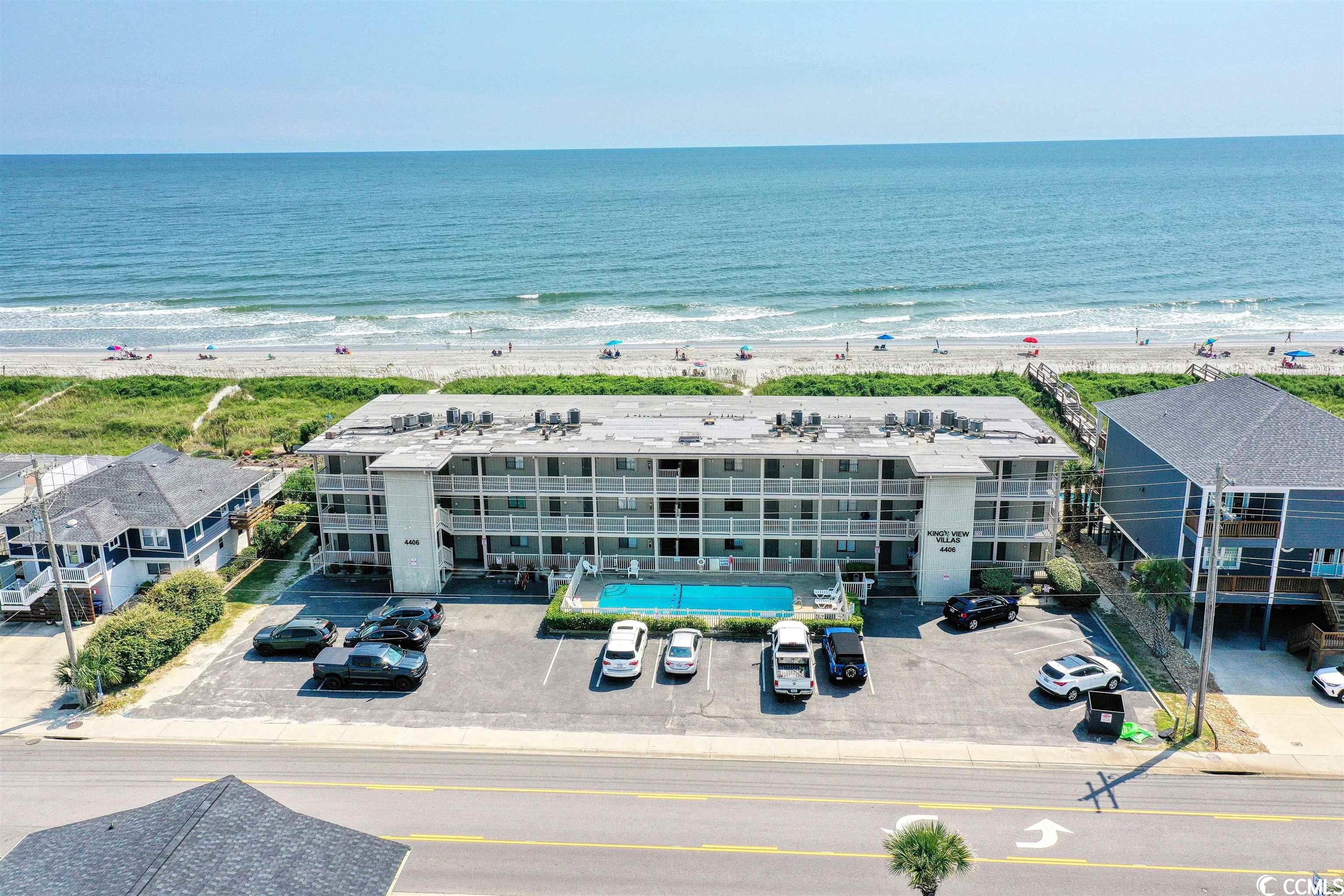 views...views... views! this remodeled furnished 2 bedroom oceanfront condo is situated on a beautiful natural section of north myrtle beach, sc known as cherry grove beach. sit on your double balcony and relax as you gaze at the ocean over the abundant sand dunes, sea oats, and wildflowers. these are truely million dollar views. there is not a better location along the grand strand. this pristine section of ocean front sets the bar for ocean front living. the condo has been impecabbly remodeled and has been updated with too many features to mention but here are just a few... new coastal carrier hvac and ecobee thermostat w/app control in 2022...new hotwater heater in 2018...new refrigerator in 2022...waterproof-cork sound barrier wide plank flooring (lpv) throughout the condo...goregeous quartz countertops...tiled backsplash and borders... coastal beadboard accents... new 5" baseboards... the flare of modern barn style doors in both the living area and primary suite... freshly painted in a neutral light color palatte...retractable hurricane shutters installed on both windows and sliders in 2022... and an exterior private storage closet for your beach toys. all this home lacks is your family photos. the complex has all the amenities you are looking for... easy private beach access... outdoor shower... outdoor pool...bike rack... and 2 grills for those afternoons of entertaining. the location is just a few blocks to a public boat ramp, public fishing dock, and walking distance to cherry grove pier.  kings view villas is a sought after boutique style complex that screams beach serenity and well maintained. the hoa put on a brand new roof and resurfaced balcony. the hoa fee includes homeowners insurance, pest control, cable, internet, water/sewer/trash, pool service, and landscaping.  the views, the sound of the waves, the salt air, and the tranquilty are guaranteed to improve your quality of life.  make an appointment to see your future beach home today!!!