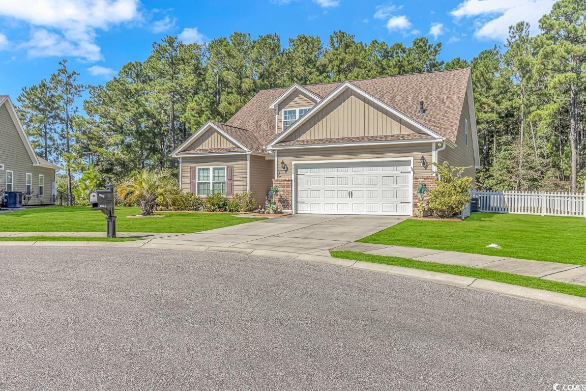 this fabulous well-maintained home is centrally located in conway only 30 minutes from the beautiful beaches of myrtle beach, and minutes to historic downtown conway and the exciting coastal carolina university. tiger grand is an established community with mature trees, sidewalks, streetlights, and ponds throughout making you feel right at home. with five bedrooms and three full bathrooms sitting on a large wooded lot this house will be able to become a family's sanctuary. the first-floor master bedroom includes an on suite with double sinks and a large walk-in closet.  two additional bedrooms and a full bathroom are also on the first floor. natural gas stove, granite countertops, stainless steel appliances, and a large pantry allow the chef to have plenty of room to spread out while keeping the conversation going with the open floorplan. the loft space would make a wonderful game room or second living room. two additional bedrooms and a full bathroom can be found upstairs. the two-car garage has shelving that will convey to help with your storage needs. enjoy your morning coffee or evening drinks on the screened-in porch with a private view of the woods. this large lot is fully fenced and is a gardener's dream! end your long day relaxing in the hot tub while watching the wildlife and nature. this well taken care of home is waiting to provide its next family with memories, privacy, and plenty of space for hobbies and growth. don't miss this rare opportunity and schedule your private showing today!