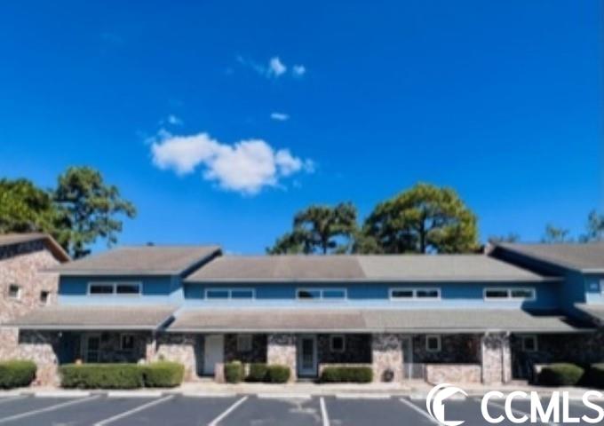 welcome to fairway ridge! this "true" townhome property is being sold as is. it features 2 br 1.5 bath. brick & t-111 siding! large front porch, quaint kitchen with breakfast bar, range, dishwasher, microwave, side by side refrigerator, garbage disposal, pantry & broom closet. first floor features vinyl flooring, 1/2 bath, under stairs access (hot water heater) as well as screened porch & patio. stairs & second floor are carpeted, and features 2 bedrooms, a full bath, laundry closet & balcony off the master. the foyer has a pull down attic access panel. don't let this pass you by. its a great opportunity to be just 2 miles to the beach!