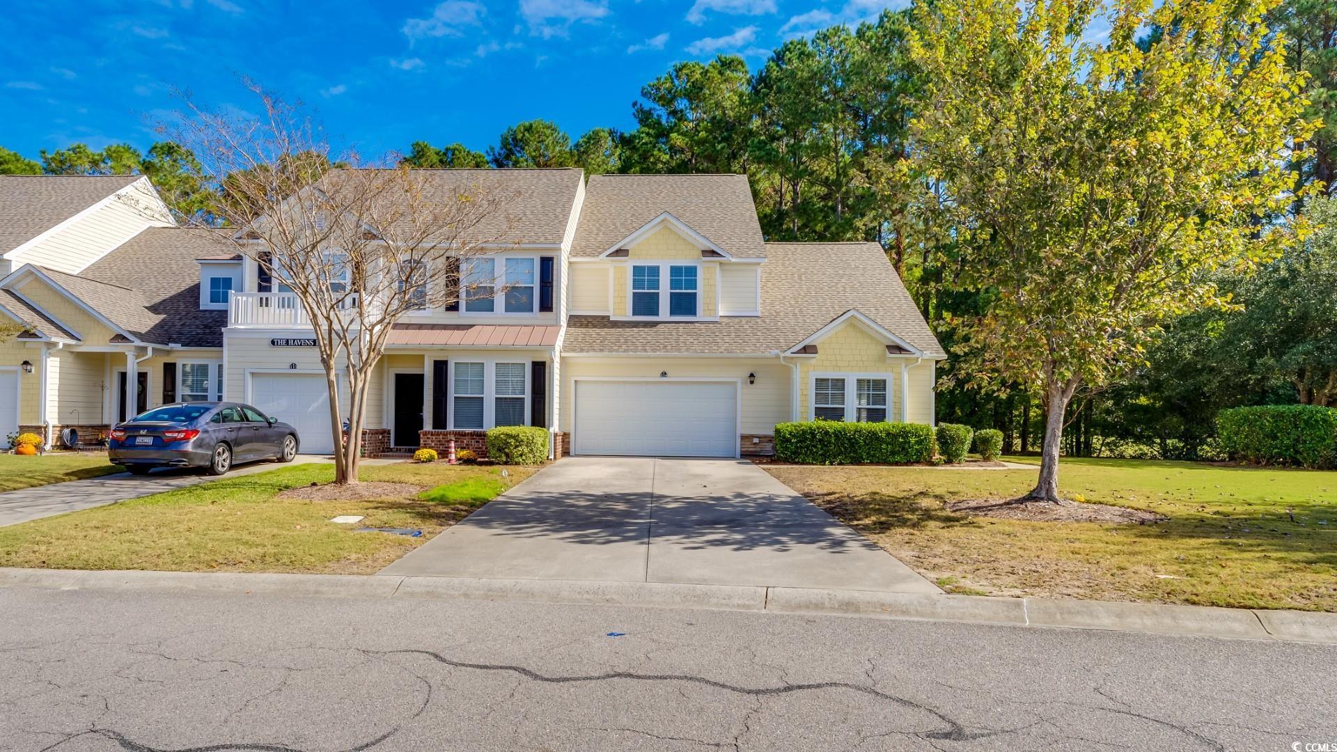 welcome to this beautiful 3 bedroom, 3.5 bathroom end unit townhouse located behind the 11th green of the norman golf course in barefoot resort. this townhouse offers plenty of conveniences. as you arrive , you'll be greeted by an extended driveway, allowing for ample parking, up to four cars that leads into a two car garage. the first floor features a master bedroom with a walk-in closet, offering a private retreat for the homeowners. additionally, there is a convenient half bathroom on the first floor, perfect for guests. the open concept design seamlessly connects the kitchen, dining room and living room , creating a space for entertaining and everyday living. the kitchen boasts appliances and ample counter space, making meal preparation a breeze. moving upstairs, you'll find two more bedrooms, one with its private bathroom. the second floor also has another full bathroom and a small loft area, perfect for an office or cozy reading area. storage will not be a problem in this townhouse, as it features a walk-in storage area, providing plenty of space for your belongings. notable updates include a brand new roof, installed just six months ago, ensuring peace of mind for years to come. the hvac system is also relatively new, only ten months old, guaranteeing efficient and reliable climate control. the water heater is only two years old. to top it all off, the unit also comes with a washer and dryer for added convenience. don't miss out on this incredible opportunity to own a townhouse in the sought-after barefoot resort. as owners you also get access to the haven's community pool and also to the barefoot beach cabana. schedule your showing today. square footage is approximate and not guaranteed. buyer responsible for verification.