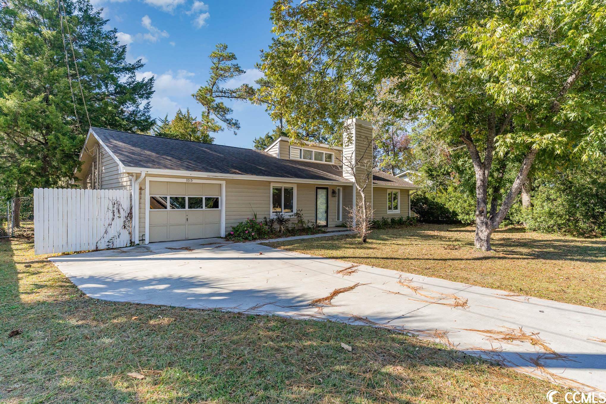 this beautifully renovated single-family home is a true gem in the heart of this coastal paradise. nestled in a tranquil community with no hoas, this move-in-ready haven offers a perfect blend of comfort, style, and coastal living.  this home has been meticulously renovated, ensuring that every inch is ready for you to move in and start enjoying the beach life right away. fresh paint, updated fixtures, and modern finishes throughout make it a turnkey opportunity.  located in one of north myrtle beach's most desirable neighborhoods, this property is just a stone's throw away from the amazing restaurants, shops and entertainment activities of the area.  say goodbye to monthly hoa fees and restrictions. this home provides the freedom to customize your space and lifestyle to your liking.  the open and airy layout creates a welcoming and functional space for family and friends. the 3 bedrooms provide plenty of room for your loved ones, and the 2 bathrooms have been tastefully updated for your comfort. the property features a beautifully landscaped yard, perfect for outdoor gatherings, barbecues, and enjoying the mild south carolina climate.  conveniently located near shopping, dining, golf courses, and the vibrant nightlife of north myrtle beach, you'll have all the entertainment and conveniences you need just moments away.  don't miss your chance to own this renovated beachside home, a place where coastal dreams come to life. contact us today to schedule a viewing and make 1015 belle dr your new north myrtle beach address. your seaside oasis awaits!   some photos in this listing have been virtually staged.