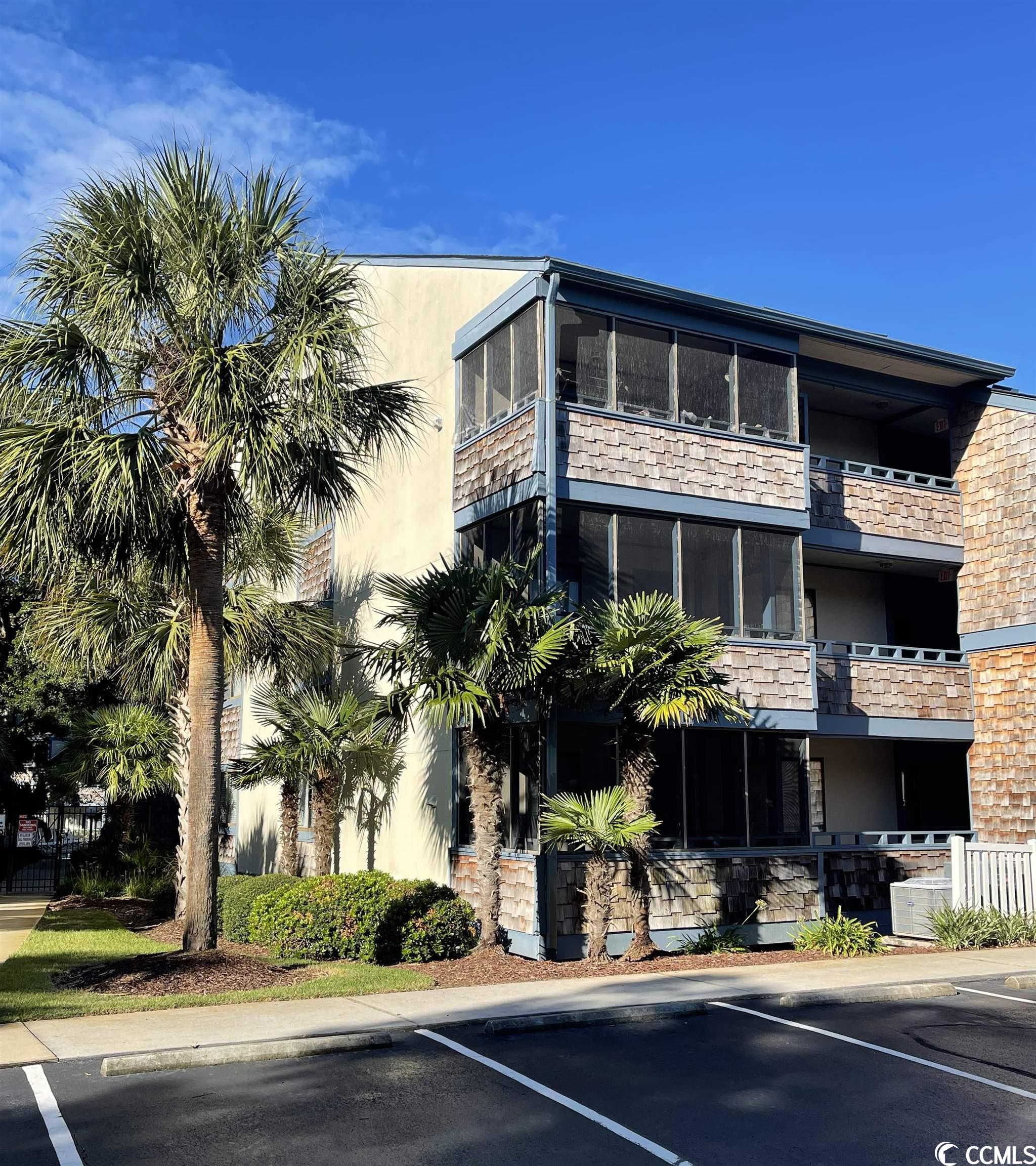 the owners of this condo use it as a second home well maintained (new carpet in living room and bedrooms, hot water heater 2021, new furniture, ceiling fans and toilets 2022) and ready for beach vacations or used as a great rental investment property.   centrally located in the very popular shore dr. neighborhood. short walk to the ocean, several restaurants, and beach bars including ocean annie's live music beach bar. shopping outlets and golf courses all close by. this end unit condo offers a larger living space then most condos in the area with spacious living areas and bedrooms. there are three screened porches with great views of the outdoor pool courtyard.  summertree has an indoor pool which is a great asset for winter rentals.