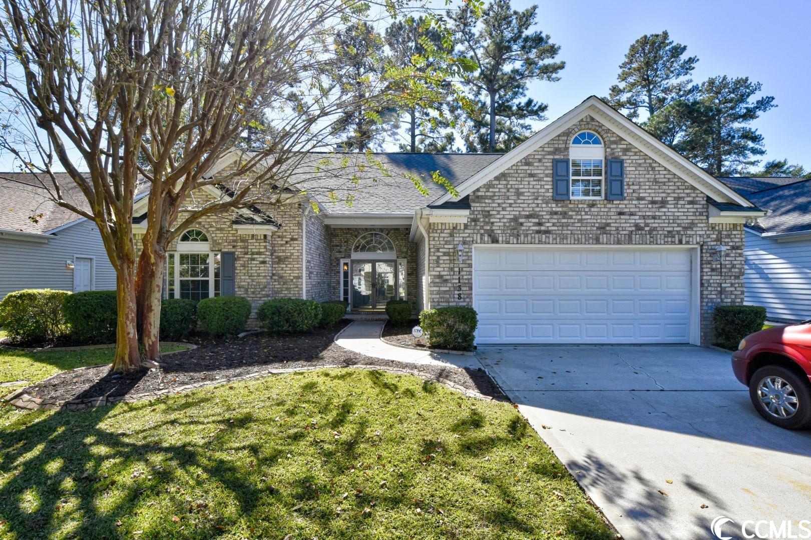 welcome home to this 3 bedroom, 2 bathroom home on a pond in the highly sought after community, muirfield at blackmoor in the heart of murrells inlet. this home features wood flooring in the foyer as you enter, leading to the spacious open floor plan of the main living areas with a fireplace as a main focal point. the kitchen is equipped with all stainless steel appliances, granite countertops, a work island, pantry for extra storage, a breakfast bar, and room for a breakfast table- separate from the more formal dining area. just off the living room are double doors leading to a room that could be an office, playroom, den, or guest room- the options are endless. each bedroom offers a ceiling fan, plenty of closet space, and easy access to a bedroom, while the master also offers a walk-in closet and private master bath with double sink vanities, garden tub, and separate shower. enjoy afternoons in your huge, tiled carolina room with skylights and a beautiful view of the pond, and spend your days socializing with friendly neighbors at the community amenities. blackmoor offers a community pool, tennis courts, pickleball, prestigious golf courses, and is perfectly situated close to the area's schools, grocery stores, and all of the finest dining, shopping, and entertainment attractions including the famous marsh walk of murrells inlet. you won't want to miss this, schedule your showing today!