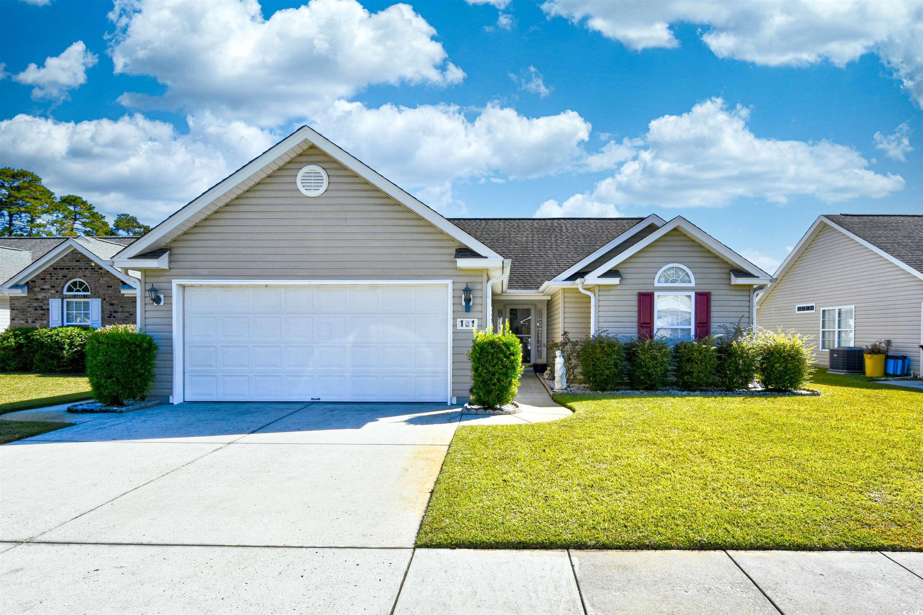 welcome home to this 3 bedroom, 2 bathroom home in the highly sought after community, mallard landing village in the heart of surfside beach! this single-level home features tall vaulted ceilings throughout, a 2 car garage, and is located on a quiet street with a view of the pond from your back patio! the kitchen is equipped with all stainless steel appliances, a desk area, breakfast bar, and room for a breakfast table- separate from the more formal dining room. the living room features a carolina room, offering additional seating and access to the backyard. each bedroom offers a ceiling fan, plenty of closet space, and easy access to a bathroom, while the master also continues the vaulted ceilings and offers a spacious walk in closet and private master bath with a garden tub and shower. mallard landing village offers low hoa fees, friendly neighbors, and is perfectly situated in a quiet community in surfside beach, close to all of the area's famous dining, shopping, golf, and entertainment attractions, with just a short 5 minute drive or golf cart ride to the beach. you won't want to miss this. schedule your showing today!