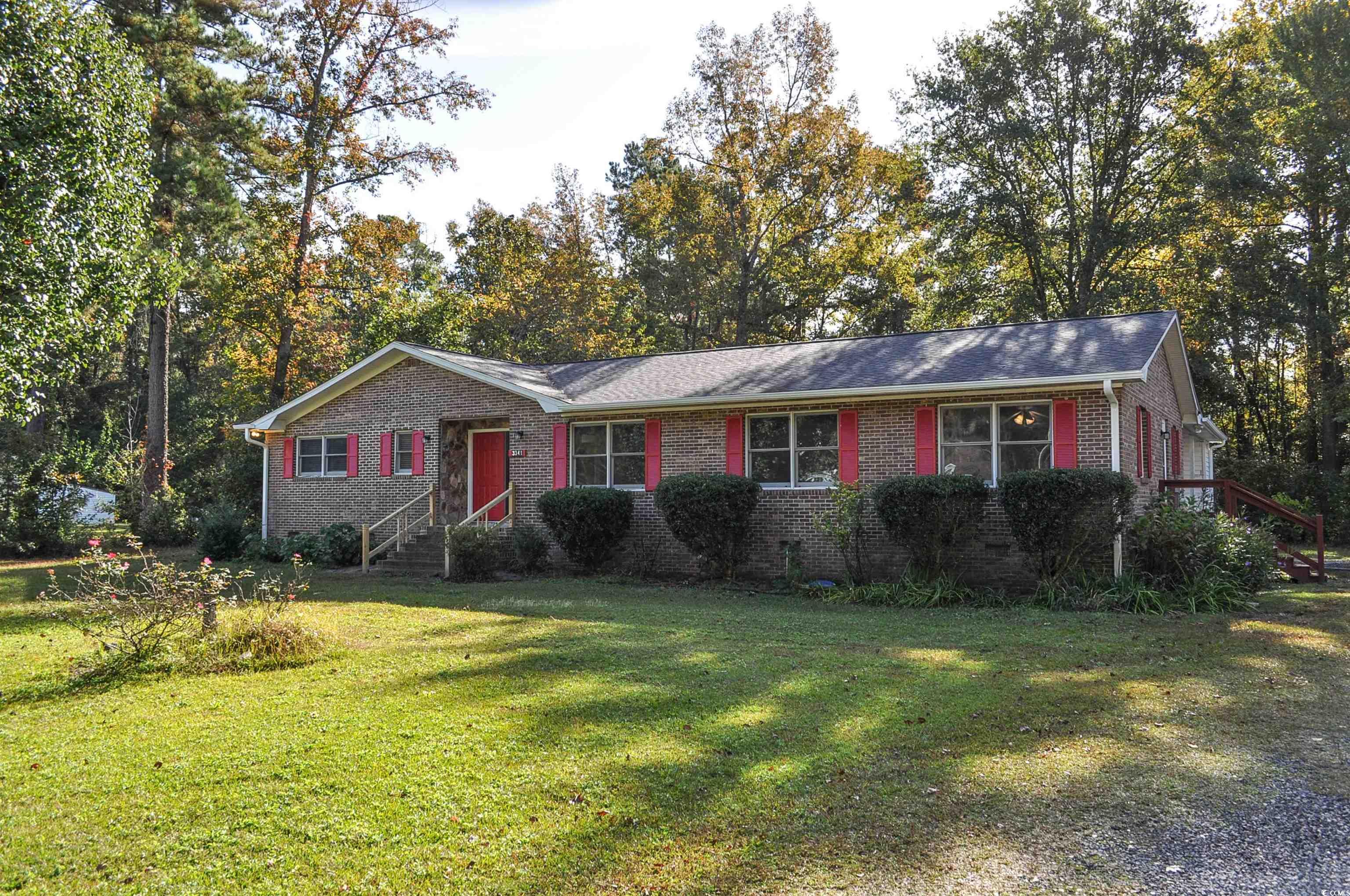 looking to find an all brick home located on .87 acre of land, no hoa and close to conway? that is quickly becoming a very rare commodity!  this home is all that and more.  welcome to blain lane, a quiet street away from the hustle and bustle and yet still so close to everything the grand strand has to offer.  at over 2000 heated square feet with 4 bedrooms and 3 baths the possibilities are endless.  upon entering the foyer with double doors, you are greeted with 2 coat closets for tons of storage.  adding to the versatility of this home, one of the bedrooms has it's own private entrance and full bathroom, so it could easily be a mother-in-law suite or office.  the kitchen is very large with space for breakfast nook and huge dining room area.  a very large laundry room is off the kitchen with enough space for pantry items as well.  the back yard offers lots of privacy with plenty of room for boat, camper....any toy you have!  just a short trip to sandridge community park with basketball courts, pavilions and a great kiddie park.  please come and see for yourself what this exceptional home has to offer.