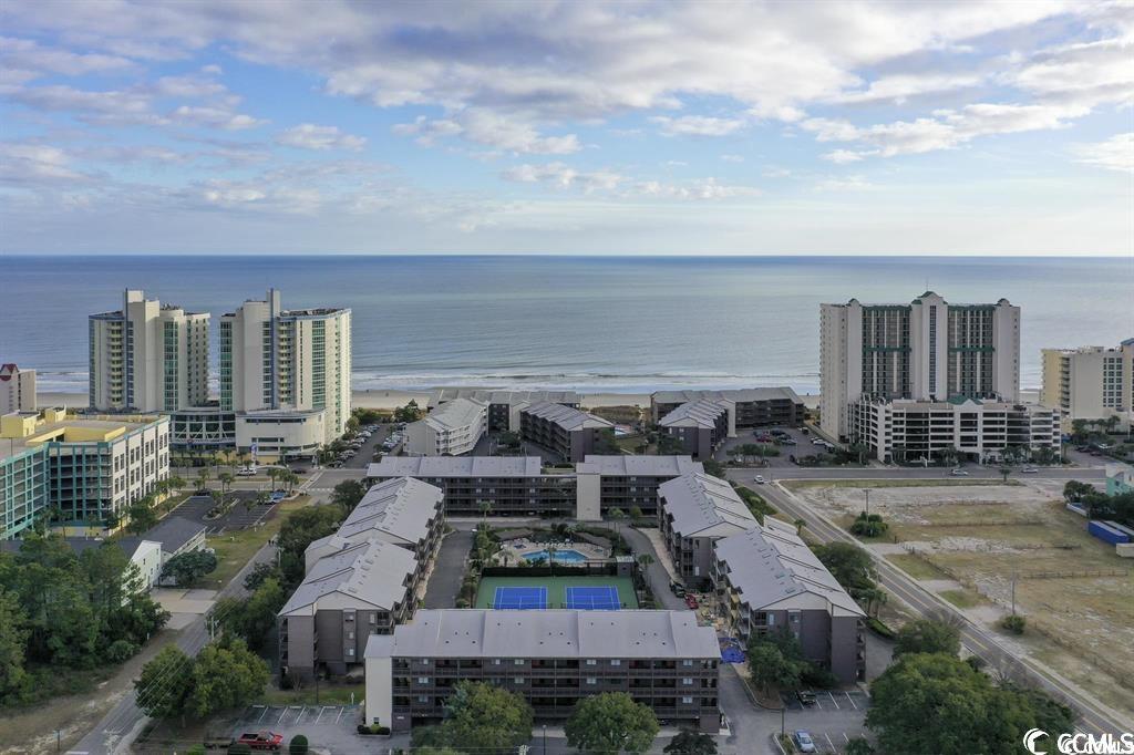 oceanside, ocean & pool view, top floor condo in popular tilghman beach & racquet club. angled toward ocean for enhanced view. vaulted ceiling and sky light. 2 swimming pools, 2 whirlpool spas, 2 baby pools, 2 tennis courts (1 lined for pickle ball), elevators. extensively remodeled in 2021 including new granite counter tops, vinyl plank flooring, washer & dryer, refrigerator, dishwasher, stove, microwave, mattresses & box springs. tbrc is a rare condo complex where owner is allowed golf cart. located on 1 of the few oceanfront lots between the low-density, single-family zoning of the upscale tilghman estates & the shops, restaurants, & shag clubs of main street. 3 block walk to fat harold's & ducks shag clubs, 5 blocks to hoskins & mclean park. square footage, zoning, features, amenities, etc. not guaranteed. buyer responsible for verification.