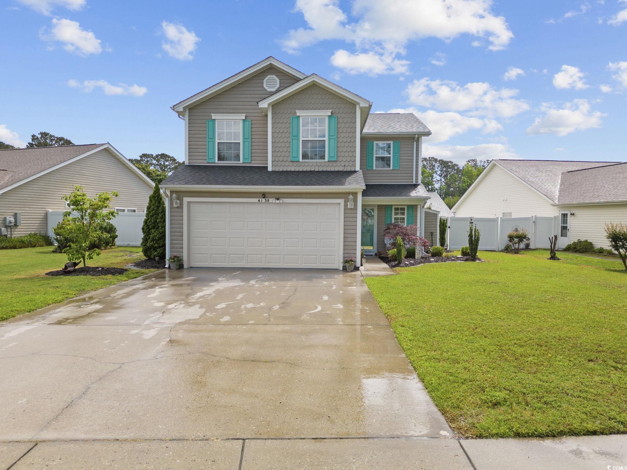 charming 4br-2.5ba + carolina room with great curb appeal in wrens crossing. the spacious open floor plan has plenty of natural light.  the large living room area has a fireplace, ceiling fan and lvp flooring which carries through the kitchen, carolina room, master suite & an additional bedroom. the kitchen features solid surface countertops, newer appliances, breakfast bar, breakfast nook and plenty of workspace. between the kitchen & living room is the lovely formal dining room with hardwood flooring. the sun-filled carolina room has an arched doorway with decorative columns. also, the carolina room has a glass slider which leads to the comfortable & roomy screened porch, the perfect place to end your busy day.  the open staircase leads to all 4 bedrooms & 2 full bathrooms. the spacious master suite has a walk-in closet & sitting area and a lofted ceiling. in the master bath is a walk-in shower, separate garden tub & a double sink vanity. 4138 wrens crossing has one has one of the largest lots in the community, plenty of back yard space and completely fenced! roof was replaced in 2023. low hoa fees, which includes a community pool. wrens crossing is 3 miles to the intracoastal waterway activities and 5.5 miles away from the north myrtle beach & cherry grove beaches & a variety of shopping venues, great restaurants, first class golf courses and the very active nmb main street!