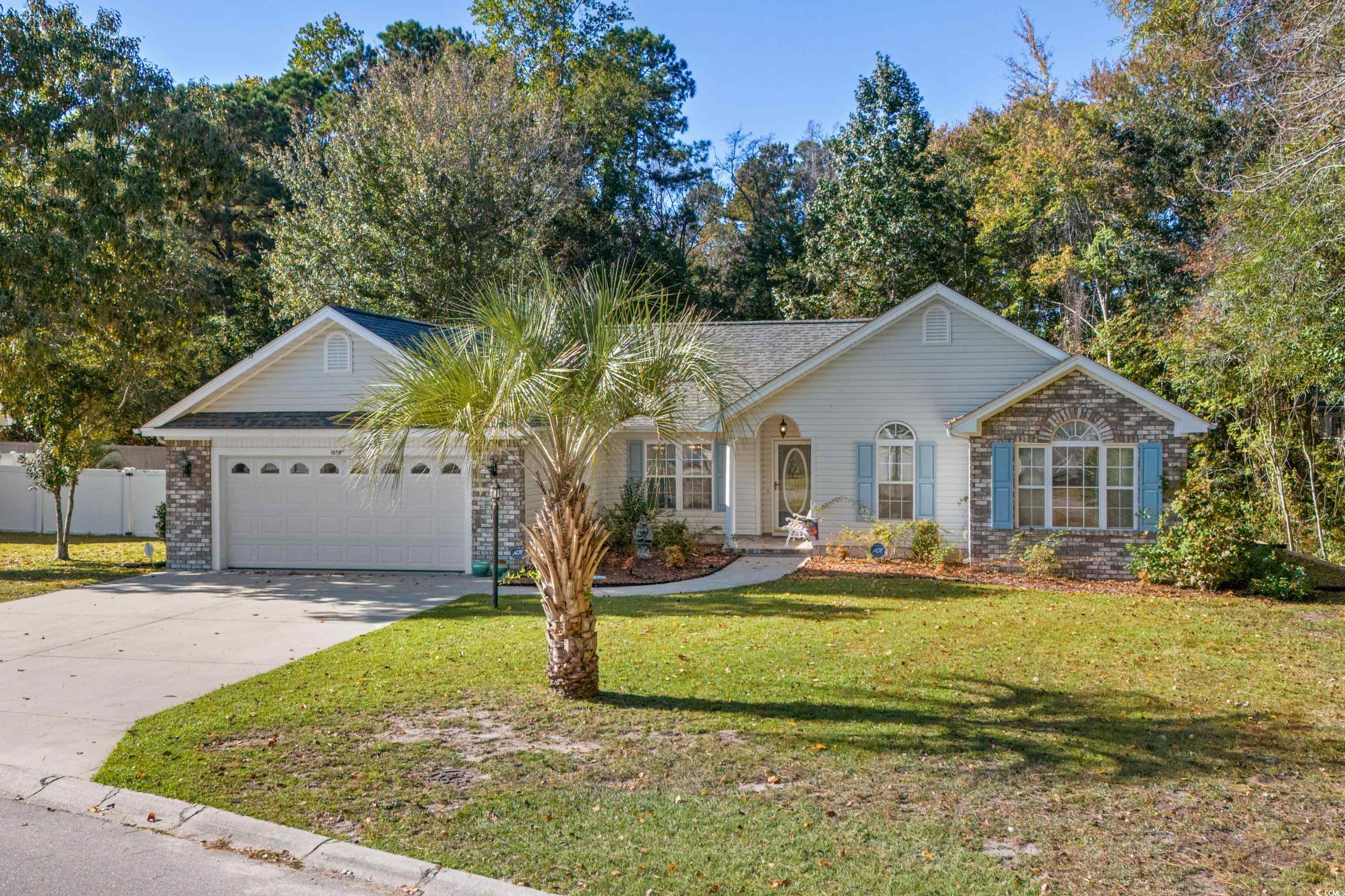 discover this inviting home, where spaciousness and warmth coexist harmoniously. picture yourself as the proud owner of this residence, offering ample living space and an expansive .76-acre lot. (if facing the house, property extends into the wooded area to the right providing a large and natural buffer.) the open living and dining area, complete with vaulted ceilings, create a grand and inviting atmosphere. the well-appointed kitchen is perfectly integrated into this open space. accessible from the kitchen, an additional den/family room opens onto a screened porch, providing a versatile space that could easily be transformed into a 4th bedroom or a secondary suite. sit back and relax in the 23 ft. long sun filled carolina room, or enjoy outdoor barbecues on the back patio. the 2nd and 3rd bedrooms have vaulted ceilings and ceiling fans, adding comfort and style.the primary bedroom suite features a tray ceiling, ceiling fan, walk-in closet, a linen closet, a shower, and a vanity. there's ample storage within the house, including numerous closets, a two-car garage with pull-down stairs, as well as a detached shed in the backyard. convenience is at your doorstep, with easy access to shopping, dining, medical facilities, and the beach. plus, downtown conway is just a short drive away. refrigerator, range, dishwasher, washer/dryer, window blinds, and mounted television convey.  if this sounds like your dream home, don't hesitate to call for a private showing today!