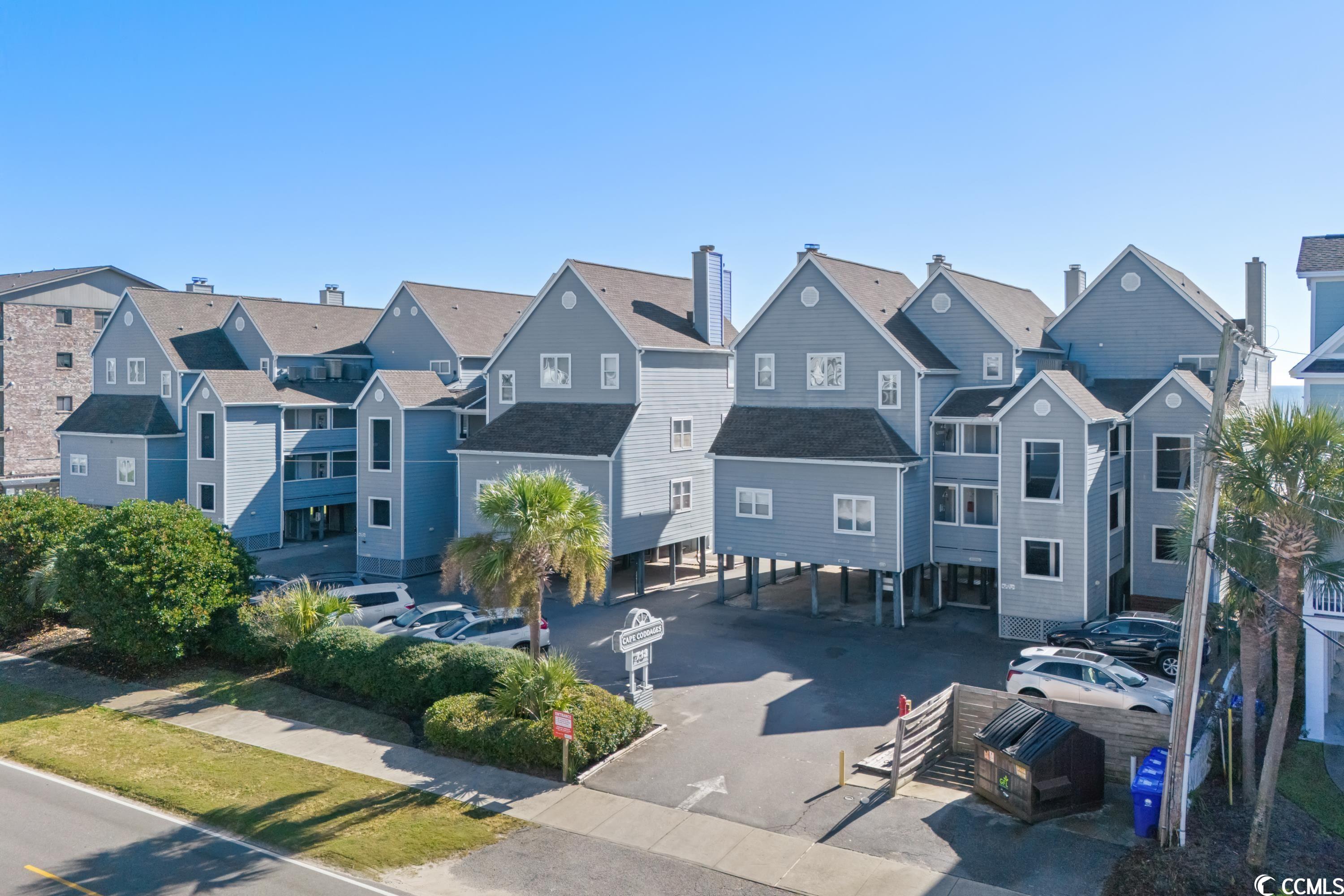 rare opportunity to own at cape coddage i - direct oceanfront end unit in desirable surfside beach!  an oceanfront paradise with plenty of privacy! 2 bedrooms/ 2 full baths and and additional half bath.  fabulous views! "townhome style" floorplan: living areas (kitchen, dining area, great room and balcony) on the first floor of the property -   oceanfront bedroom and second bedrooms (both with private baths) on the second floor of the property. on second floor. in immaculate condition: open kitchen with granite countertops, and stainless appliances - lvp flooring throughout main level. - great view from the kitchen through the dining room area and living area to the ocean. large balcony with  unobstructed view of oceanfront and long view up the  the north coast - watch the sunrise from the great room or the balcony. hvac replaced in 2022 - outside balconies replaced in 2022-2023. pilings replaced and/or repaired under building in 2022-2023. gutters installed and all (hardie plank) siding replaced in 2022-2023. outside storage closet on the ground level.  all measurements and square footage are approximate and not guaranteed. buyer is responsible for verification.