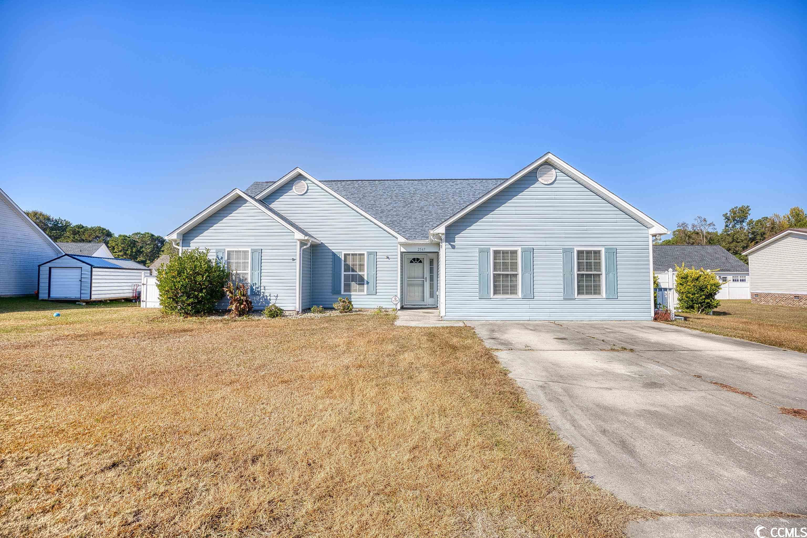 beautiful home in a great neighborhood with no hoa.  master bedroom with double sink and shower.  garage was converted into a large family room with hardwood floors or could be used as a 4th bedroom.  vaulted ceilings in living room and master bedroom.  large fenced in yard with shed and patio. carolina room.  plenty of parking in driveway. hvac is only 2 years old.  new roof installed 1/2023.  close to all major roads, golfing, shopping, restaurants and only a few minutes to the beach.