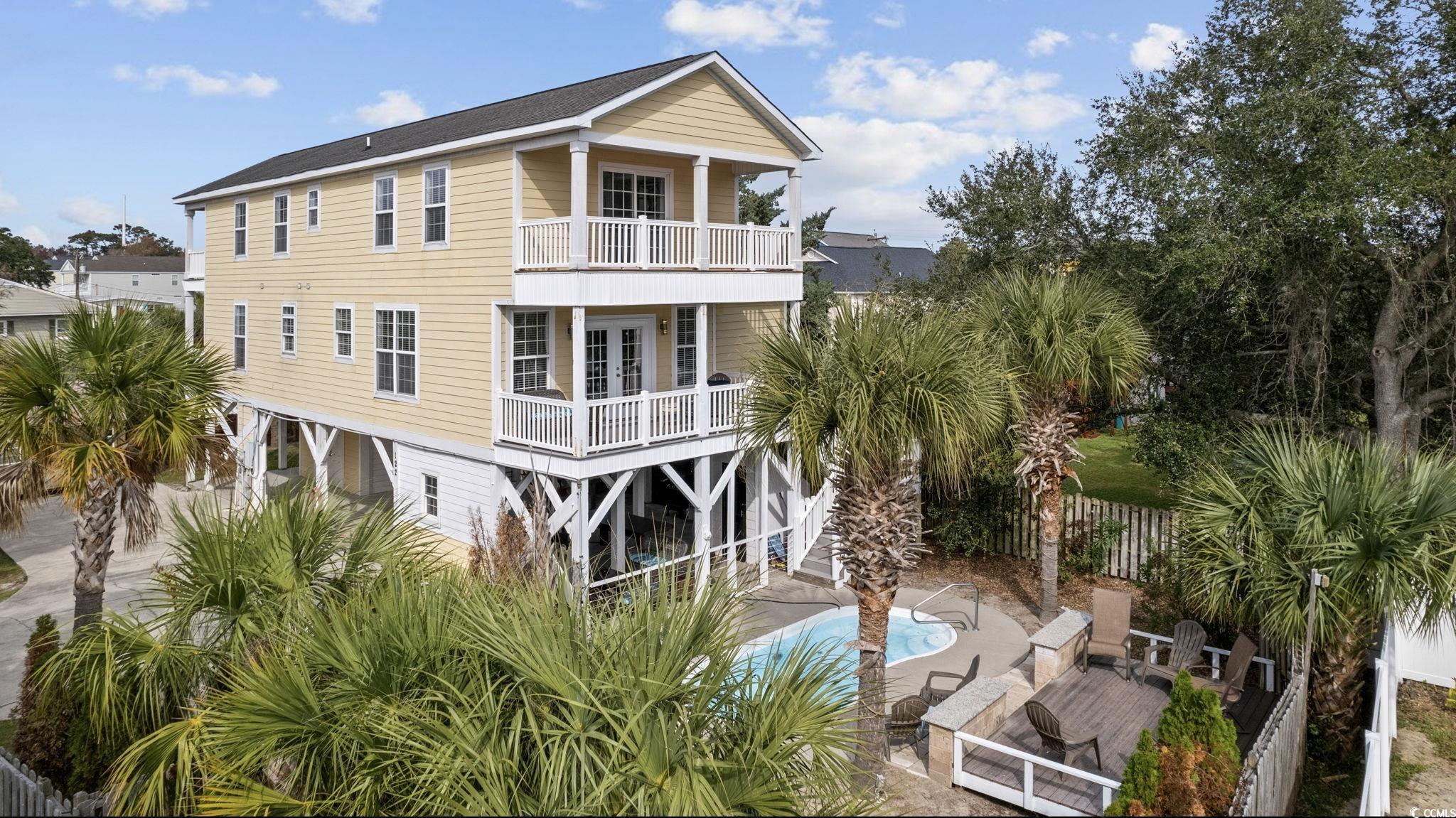 this fully furnished home comes with 5 spacious bedrooms, 5 full baths, and 2 half baths.  with only a short walk to garden city beaches, this property sits on a large lot, with marsh views, and a long 200ft driveway.  this home is perfect for entertaining, with a private pool, hot tub, outdoor kitchen, and outdoor half bath.  the property offers many upgrades including an elevator, newly painted cabinets, and newly installed luxury plank flooring.  use this home as the perfect beach escape or serve as a high-producing rental property.