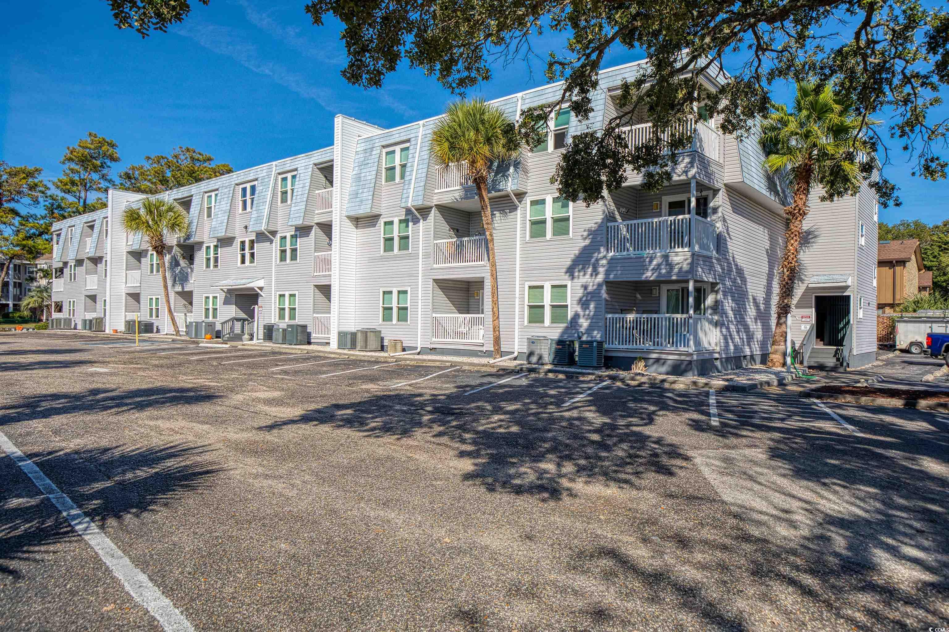 step into coastal living with this chic 2-bedroom, 2-bathroom first floor condo, strategically located just off the sought-after ocean drive in north myrtle beach. only a block away from the ocean and a leisurely stroll from the trendy main street, you're in the heart of the action, with hotspots like fat harolds and hoskins just around the corner. this stylish condo has been impeccably maintained and was only used as a part-time investment, ensuring a fresh and contemporary feel. the open and spacious floor plan boasts a cozy kitchen with a charming breakfast nook, enhanced by new sliding glass doors and high-impact-resistant windows. unwind in the rarity of having your own private master bath. picture yourself sipping your morning coffee on the expansive, covered porch with views of the inviting pool. this unit comes fully furnished and turnkey, making it a dream for those seeking a permanent residence or a stylish vacation home. don't let this fantastic opportunity slip away! schedule a showing or virtual tour today to experience coastal living at its finest. your dream home awaits!