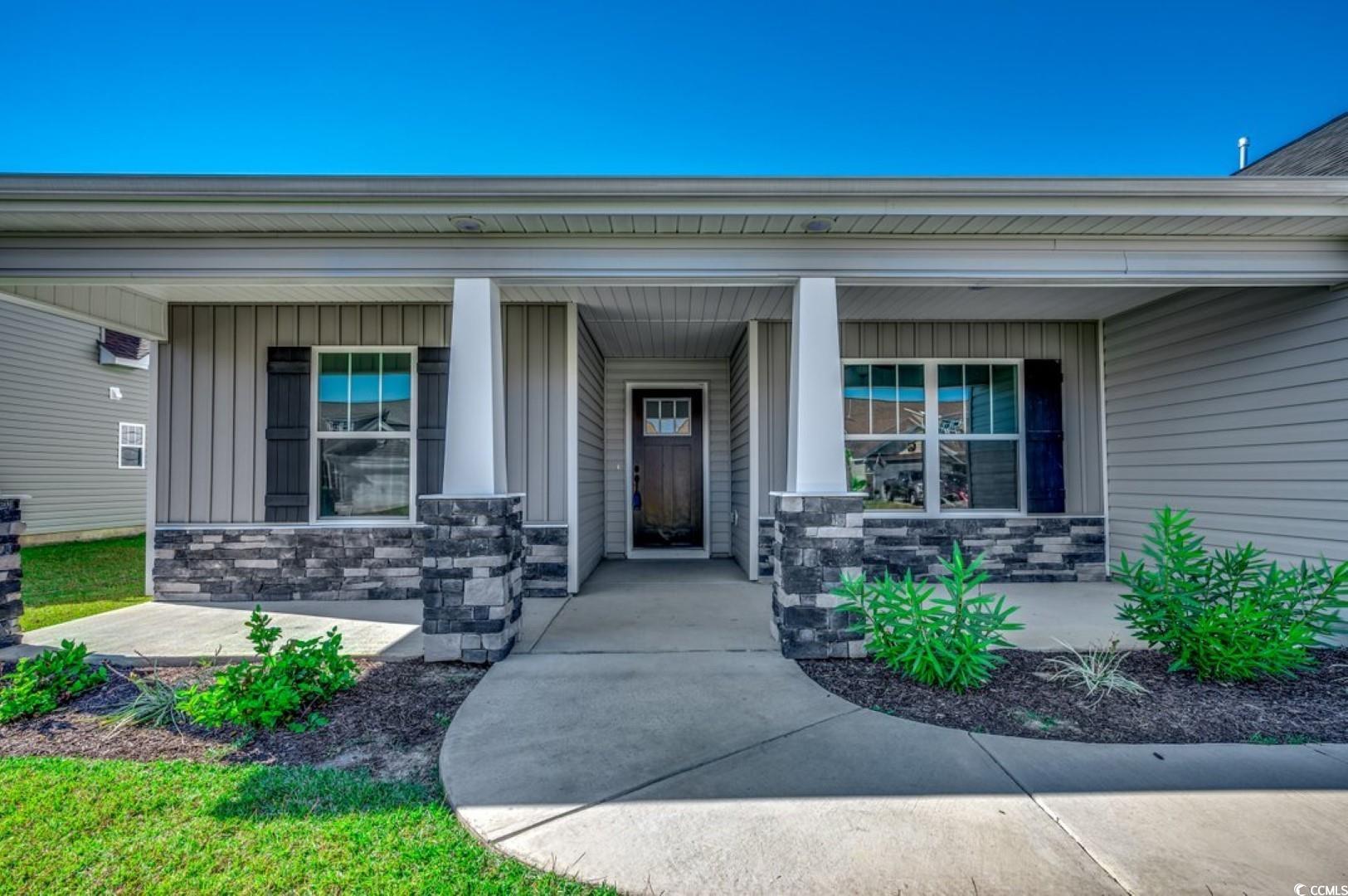 new construction with over 3,700 square feet!! tons of room-first floor consists of the owners suite, 3 additional bedrooms and 2 full bathrooms, formal dining room, living room, laundry room, foyer, galley room, rear porch and kitchen w/breakfast nook. the second floor you'll find a large family room and 3rd bathroom. the owners suite has a large shower with two shower heads and a built-in bench. easy access from walk in closet to laundry room makes this layout even more convenient. covered front porch and covered rear porch bring lots of options for outdoor activities. waterproof laminate in living room, foyer, halls, dining room. upgraded shaker style cabinets in kitchen and baths, stainless steel appliances and granite countertop in kitchen. wainscoting in foyer and 5 1/4" baseboards for custom look!! home also includes taexx™ pest control tubing, lawn irrigation and ring™ video doorbell at no additional cost!!! stone accents on the exterior as well. sandridge commons is a new community located in little river/north myrtle beach area only a few miles from the beach, waterway, major dining and shopping! square footage is approximate and not guaranteed. buyer responsible for verification.