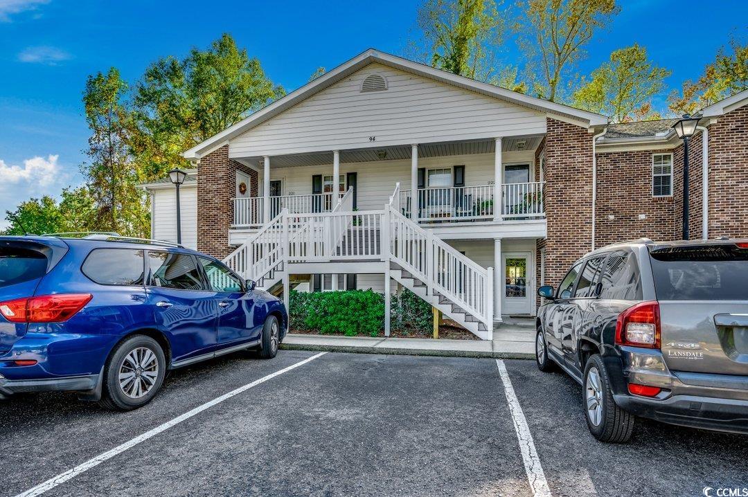 nestled just minutes away from the pristine pawleys island beaches, this captivating 3-bedroom, 2-bathroom condo isn't just a home; it's a lifestyle. immerse yourself in the tranquility of a community surrounded by top-notch restaurants and premier golf courses, conveniently situated between the vibrant myrtle beach (just a 40-minute drive) and the historical charm of charleston (only 75 minutes away).  as you step inside, the upgraded charm of this residence unfolds, featuring beautiful wood floors in all living areas, while the sunroom and both bathrooms boast stylish tile flooring—no carpet in sight, adding a touch of timeless elegance. the spacious living area welcomes you with a cozy propane gas fireplace, creating the perfect ambiance for relaxation. the kitchen has been thoughtfully updated with new appliances and quartz countertops, seamlessly connecting to a dining area with a convenient bar, perfect for casual meals or entertaining guests.  practicality meets luxury with the laundry area neatly tucked away in a separate room off the kitchen. the master suite is a haven of comfort, offering ample space and showcasing a well-maintained attached bathroom. down the hall, the second bathroom is conveniently situated next to the second bedroom, while the third bedroom provides plenty of space for your guests. the sunroom adds versatility to your living space — it can be transformed into an office, den, recreation room, or anything you desire.   step outside onto the front balcony to enjoy the sunset, soak in the tranquility of your surroundings, and embrace the outdoors. this condo isn't just a place to live; it's a canvas for your lifestyle. schedule your showing today and make this your new haven. plus, with a roof only 3 years old, an outside hvac condenser unit recently replaced, and a hot water heater just 18 months old, this gorgeous condo is practically like new, set in a serene setting that completes the picture of your dream home and enjoy the community pool.