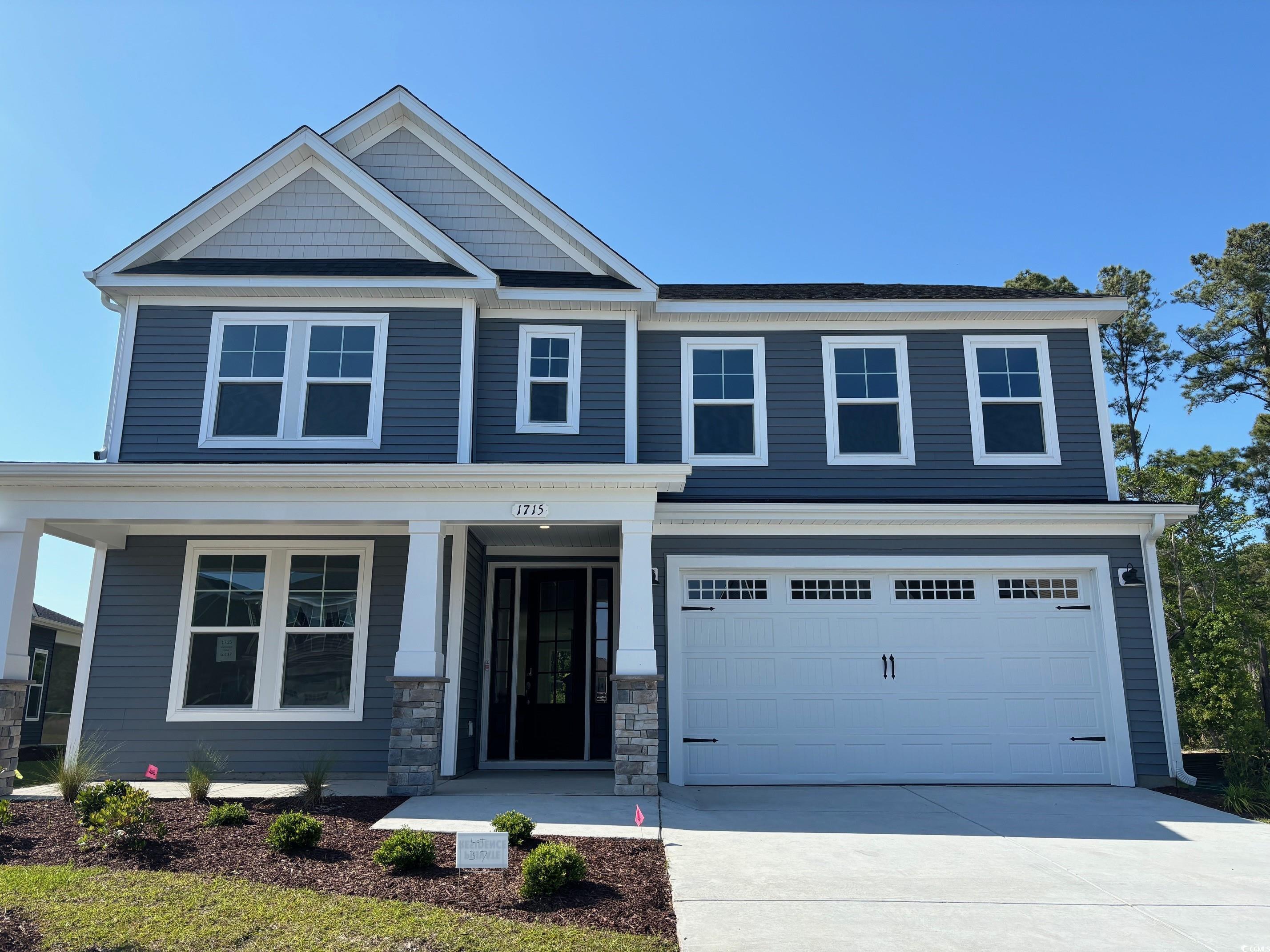 life is simply divine in the mangrove model. a whopping 3,349 square feet of space results in a new home that’s roomy enough for every member of the household. a buyer favorite, this plan offers up to five bedrooms and up to three full baths depending upon the layout you select. downstairs offers the essential space your family needs. choose to include a gourmet kitchen with extended counter and cabinet space, add a butler’s pantry for additional space, or add a shower to the downstairs bathroom to create a full bath alongside the guest suite.  the second level offers endless amounts of space for all. an owner’s suite with enormous dual closets and a spa-like owner’s bath makes for the perfect space away from the hustle and bustle. three additional bedrooms and the loft/sitting area/5th bedroom means there’s enough room for every member of the family to have their own peaceful retreat. check out the interactive floor plan and decide which options you will choose for your new home!