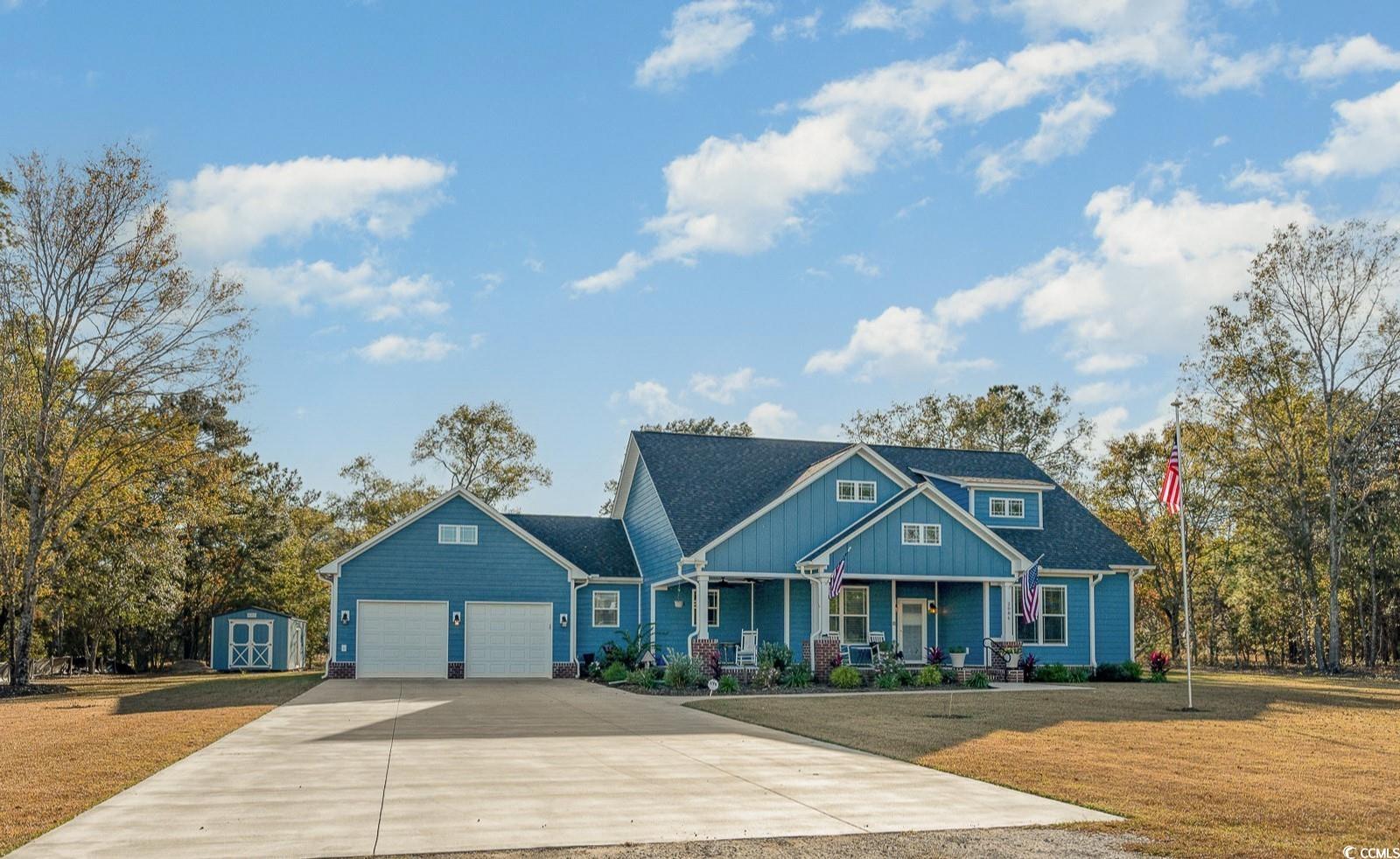 nothing on the market like this 2022 custom built beauty that lies quietly on .74 of an acre, with no hoa and just 20 minutes to the ocean! 3 bedroom, 2 bath with study and large sunroom (or formal dining room) and plank flooring that just glows with the natural light that pours in. classic contemporary style with high archways, prairie style windows, elegant wider doors with crystal knobs to show its true character. the kitchen is stunning, with a large pantry, all stainless-steel appliances and a gas range, that can be electric also if desire, as with the dryer. washer and dryer stay with the home, as does a generator and all custom-made window blinds. wider doorways and a walk-in shower make this home wheelchair friendly inside. exterior of sturdy hardie plank and brick with a fantastic front porch to relax on your quiet nights here. enjoy the rear patio with beautiful pergola for grilling and sunbathing! and what a driveway for your cars, boats, rv! there is an rv hookup on the side of the house, next to the rainbird full irrigation system, the dog guard full invisible pet fence and the whole house surge protector. oversized garage, fully insulated, heated and cooled with mini split system, tankless water heater, utility sink and metal stairs for wide entry to massive storage above garage. winch in garage will stay and 2 garage door openers convey with an app to control when away. the 12x24 detached shed has electric ran to it so tinker away! there is plenty of room here inside and out, so book to see today! your realtor has a feature list to provide you as there are so many bonuses with this home for you to know about and love!