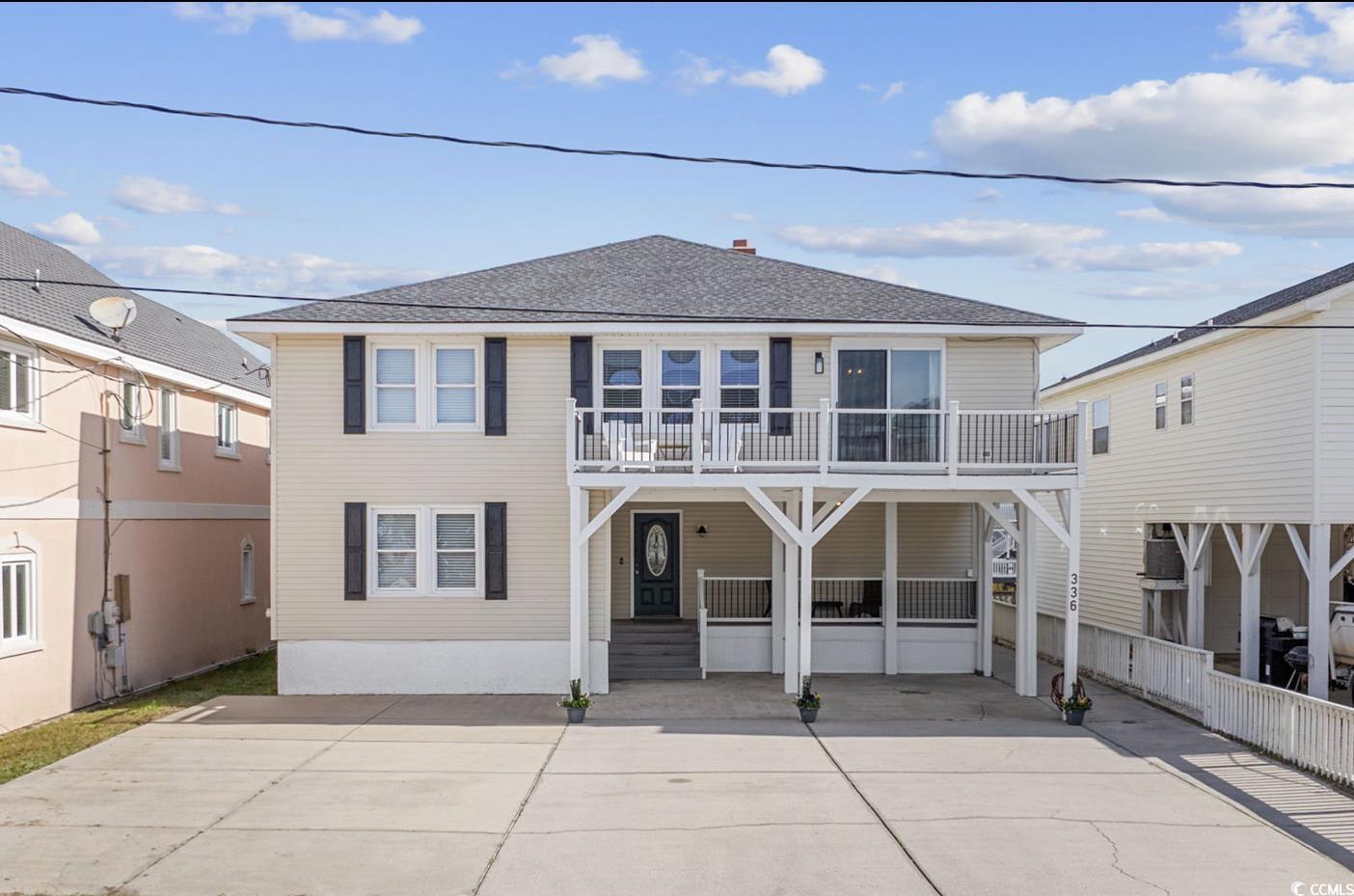 are you looking for a large home with space for everyone? one that has all updates everyone wants, with the charm and character of the beach homes of yesteryear?  look no further, the original wood floors and cypress tongue and groove paneling have been preserved. this home has 6 generous sized bedrooms, 5 newly updated full baths, located on 2 levels, all above ground.  each level has its own living space with a fireplace, creating a stunning focal point for each room.  the newly renovated kitchen is on the second level, adjoining the dining room that can easily seat 12. located on the highly desirable far north end of cherry grove. the marsh and nature preserve views are spectacular from both the back and front of the home. located near the end of the street offering more privacy than most channel homes. three decks for you to enjoy sunrises and sunsets with railings and decking constructed with maintenance free composite material.  the lower back deck is huge with room for the entire group! the seller has applied for and completed all the steps to secure a permit for a dock.  once approval is granted, the permit will be transferable and is valid for 5 years.  this home has not been on a rental program for years, so there is no rental history.  however it could quickly generate rental income, if that's your goal.  speaking of history, this home was originally built on the oceanfront in cherry grove and moved to its current location many years ago.  it has no history of flood or water intrusion even during hurricane matthew in 2016. this lovely coastal inspired home is being sold furnished.  it has been wonderfully maintained with records to view. it's ready for a new owner to use and love it!  it is a one of a kind property. don't miss it!