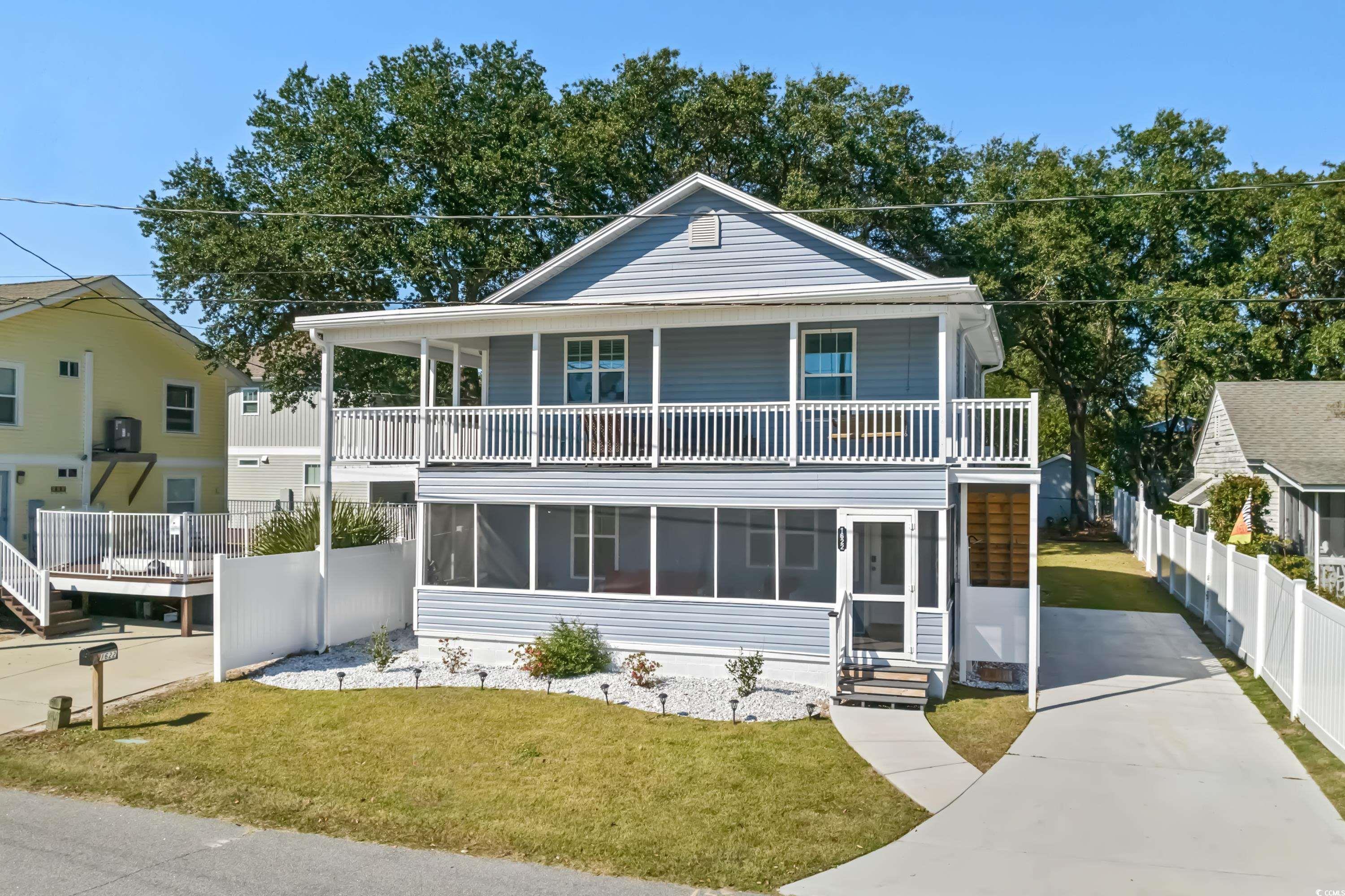 welcome to your dream beach home! this newly updated duplex offers the perfect combination of comfort and style, with two bedrooms and two bathrooms downstairs, and two bedrooms and one bathroom upstairs. with separate entrances. as you step inside, you'll be greeted by a bright and airy living space, showcasing the beautiful ocean views that this gem has to offer. the interior has been tastefully designed with modern finishes and attention to detail, creating a perfect blend of coastal charm and contemporary elegance. the backyard of this property is truly a slice of paradise. with a spacious patio area, it's the ideal spot to entertain friends and family or simply unwind and soak up the sun. whether you prefer hosting summer barbecues or simply enjoying a peaceful evening under the stars, this backyard oasis has got you covered. parking will never be a hassle, as this beach home features off-street parking through its brand-new driveway. located in a desirable neighborhood, this duplex offers the best of both worlds - a tranquil retreat just steps away from the beach, yet still within close proximity to local amenities, dining, and entertainment options. imagine waking up to the sound of crashing waves and having the beach as your playground. don't miss the opportunity to make this beach home your own. it's a rare find that combines the convenience of a duplex with the allure of ocean views, a beautiful backyard, and off-street parking. contact us now to schedule a private viewing and experience the coastal living you've always dreamed of. please be sure to contact the listing broker or your real estate professional. all measurements and data are deemed reliable but are not guaranteed, buyer and or buyers agent to verify please.