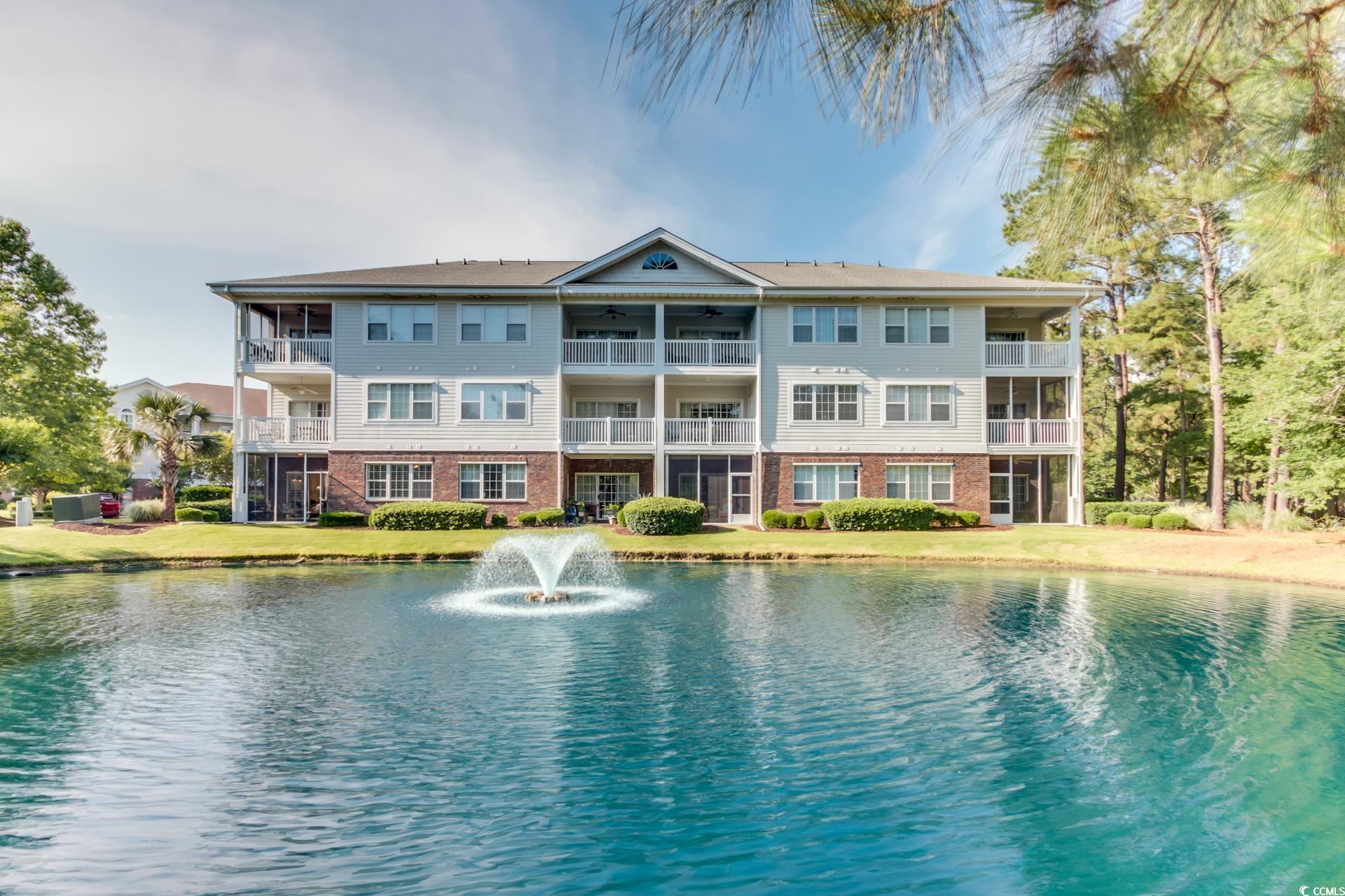 look no further! where else can you find a value like this?! gated community on the golf course! top floor spacious 2 br 2 ba split bedroom end unit with over 1000 square feet in private/quiet cul de sac of barefoot river crossing community - fully furnished, gorgeously updated, vaulted ceilings only found in top floor units! natural light galore only found in end units with extra windows in kitchen and dining area and a corner view balcony looking out over the pond with water feature and gorgeous golf course views!  the kitchen has been recently updated with luxury vinyl plank, granite counters, updated white shaker cabinetry and stainless appliances! both bathrooms are also luxury vinyl plank with new solid surface storage vanities and coastal lighting fixtures! both bedrooms and the living area have quality ceiling fans! the generous sized back porch has indoor/outdoor carpeting and a nice storage room for all your clubs/beach gear etc! short term rentals are allowed so this condo can satisfy so many needs/wants - a permanent residence or a second home with golf and shuttle service to the beach, a vacation rental investment, or a combo vacation home/rental! don't miss your opportunity to make this wonderful condo your own!