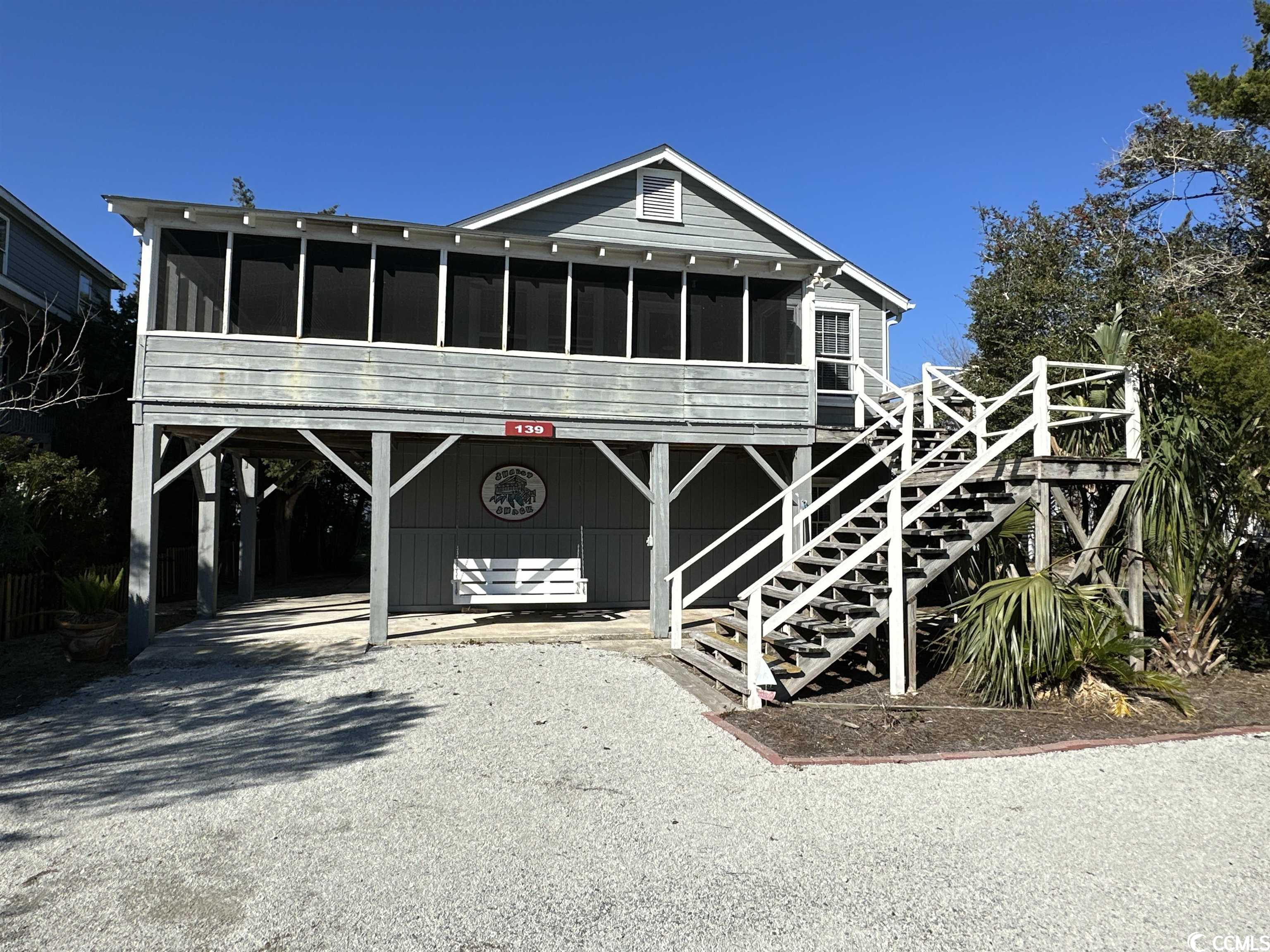 don't miss your opportunity to purchase this rare and wonderful creekfront  4 br / 3 bath home on the north end of pawleys. stunning sunset views from this great location that offers convenient access to both the beach, a public landing 1 block away, and quick boat access to both pawleys and litchfield creek as well as the ocean. sip a cup of coffee from the family room on the 2nd floor or from the downstairs rear porch as you relax a plan your day's upcoming adventure. take a quick stroll to your covered dock to check a crab trap or to enjoy a stunning pawleys island sunset with a cocktail. your private dock with floater is the perfect spot to park your skiff and do a little early morning or evening fishing. float a tube or paddle board on our picturesque, peaceful pawleys creek. the possibilities are endless! step inside this cozy cottage that still has all the charm that only pawleys island can offer. expansive porches on both the front and rear of the home filled with eating areas and a hammock that begs for quiet nap. upstairs there is 1 br and a bath with shower and then 3 more bedrooms downstairs with 2 updated baths. it a perfect layout as a full time residence, but would also make a fantastic 2nd home or rental investment.  friends and family will enjoy this home's quick access to the beach for a morning walk with the dog or a leisurely bicycle ride. plenty of parking for 6 or more cars and storage both under the house and in the rear. close to all of pawleys awesome restaurants and just 30 minutes to the airport and a little more than an hour to historic charleston. historic georgetown and popular murrells inlet are just a short drive as well.  come grab your little piece of paradise today and start living the pawleys island dream life!