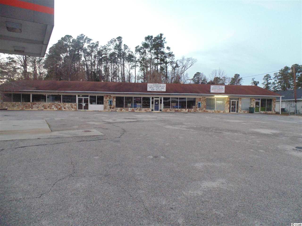 strip mall with 4 total units; 3 units for lease.   1801-2700 sf former gas station & convenience store   1705-2250 sf laundromat (ipso equipment) 10 double stack stainless steel dryers (20 total) ; 2 (50 lb) , 10 (40 lb) , 10 (18 lb) washers. # phase power coin operated, all can be converted to credit card system.    1805- leased / salon  1805-a 555 sf