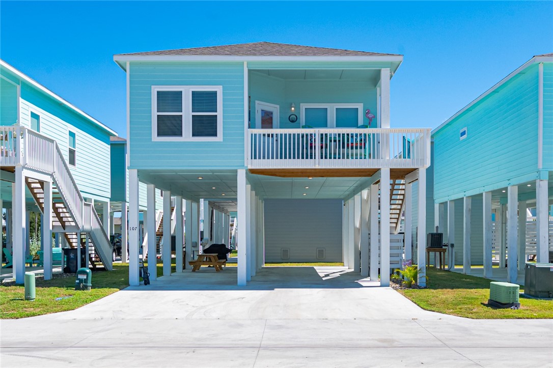 Welcome to the Salty Dog Vacation Home. This stunning three-bedroom, two-bath coastal home is currently a successful Airbnb and is rapidly building a list of repeat customers! Constructed in 2022, it is part of the newly developed Ocean Reef Subdivision, complete with a community pool, boat wash, and dog park. The open floor plan features granite counters, stainless appliances, and vinyl plank flooring. Need room for a boat? There is plenty of room with 12 ft of clearance, ample parking for your guests, and an outdoor shower to wash away the sand. This home is located just minutes from Rockport’s family-friendly beach area and gift shops.