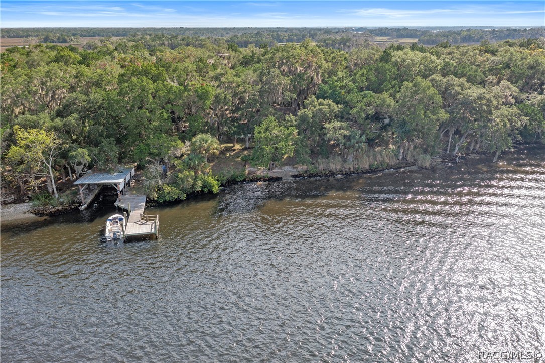 Tigertail Island
Historic Tigertail Island is your own exclusive private oasis located on the beautiful Homosassa River in Citrus County, FL. Tigertail Island is the Crown Jewel property on the Homosassa. 15 acres of natural beauty, the island is listed for sale for the first time in nearly 50 years. A lovely 2 bedroom, 2 bath cottage house sits on the highest dry land on the Homosassa River. Relax with beautiful views of Tigertail Bay enjoyed on your private porch or make a romantic fire in the fireplace and get pleasure from the solitude and peace of living a good life. With direct access to the Gulf of Mexico where world class fishing, scalloping, and recreation await and a short boat ride to restaurants, nightlife, and marinas, this island is perfect for an active family looking for an investment grade property to enjoy for years. Delight in and savor the abundant and wonderful Florida wildlife like the beloved Florida manatee, river otters, and dolphins; the island is adjacent to the beautiful Chassahowitzka National Wildlife Refuge. Tigertail Island has municipal electric service, a boat house, and a detached garage for storing your ATV’s and other equipment. This is a dream destination and available now