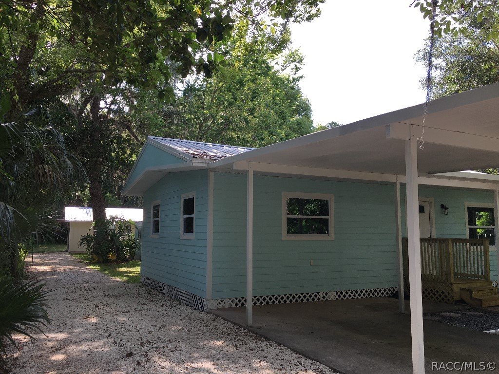 Investors dream. Two houses on one property in beautiful downtown Crystal River. Main house with three bedrooms and two bathrooms is completely remodeled and has split floor plan that makes the most of the square footage. New metal roof in 2017. New siding, windows, and doors in 2019. New wood cabinets and quarts countertop. New vinyl plank flooring throughout and freshly painted. The guest house is a 1/1 and has separate address driveway and meter so it can be mother-in-law or rented. It also had new metal roof in 2017 and freshly painted. It has Satillo tile throughout. Large backyard with fruit trees. Property is one block off Citrus Ave and in walking distance to all that Crystal River has to offer (restaurants, festivals, springs, and walking trails). Must see!