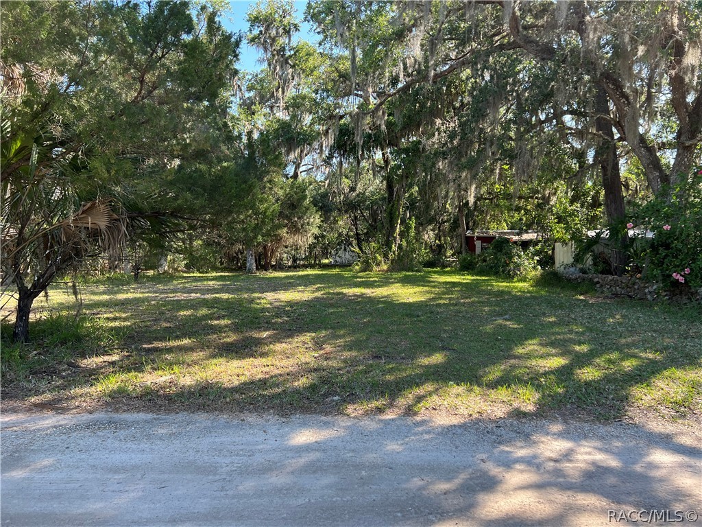 Hard to Find!  Nice CANAL WATERFRONT lot. Mostly cleared with a few scattered Trees. Zoned for Mobile, Manufactured or Site Built Home. Public water available, needs Septic. Check it out before it's gone!