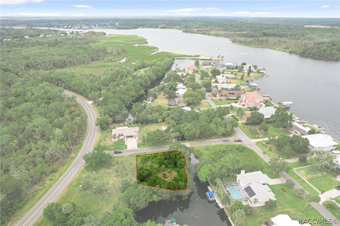 Have you been looking for a piece of waterfront property to build your dream home on? Well look no further! This 0.31 acre lot on a fresh water canal with DIRECT RIVER ACCESS is located right in the heart of sunny, Crystal River, Florida. With approx. 140 feet of waterfront property where Kings Bay meets Crystal River, so Three Sisters Springs will essentially be in your backyard! Buyers can rest assured knowing that there are no bridges/locks to navigate when getting boats out on the river or to the Gulf of Mexico; making day trips to Homosassa, Weeki Wachee, and Tarpon Springs simple. Conveniently situated just off of US-19, your new home will be a short drive away from Downtown Crystal River and numerous waterfront restaurants, marinas, shopping, golfing, fishing, hiking/cycling trails and all of the very best activities that the Nature Coast has to offer! Give us a call today with any questions you may have, this won't be on the market for long!