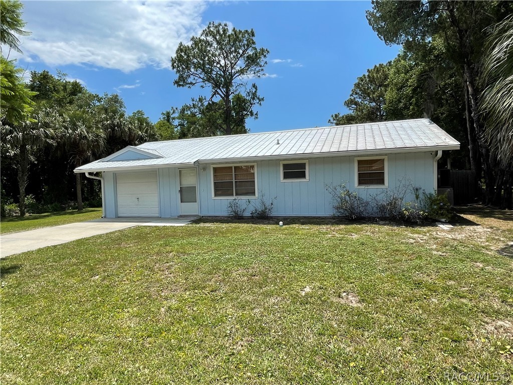 just in time for the summertime heat!!! Here is your chance to own this cozy ranch-style home with an in-ground swimming pool. Home features almost 1400 square feet of living area with 2 bedrooms, 1 bathroom, dining room, nice size kitchen, enclosed Florida room that could also be used as a 3rd bedroom if needed, 1 car garage, and a fenced backyard.  The home has been well maintained, metal roof was installed in 2014, newer carpet in bedrooms,  newer AC system and ductwork in 2019, newer appliances, the Swimming pool has a salt system and in-floor cleaning jets. There is even a new septic tank and drain field The security camera system is also included in the sale. Only a couple miles to public boat ramps to the famous Crystal River, local restaurants and shopping centers are only a few blocks away. One lucky family will be able to enjoy this home and pool for the summer. Call today to schedule your appointment to view this home before it's gone.
