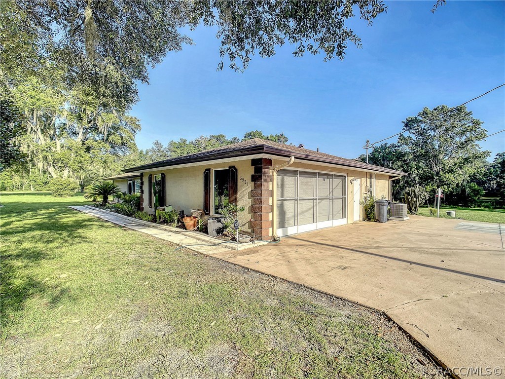 Honey stop the car! Check out this one of a kind gem with an indoor pool & waterfront green house with a private slip in your back yard! Located in the heart of Citrus County, this gem has too many features to list! Just a few are a new roof, new AC, new water heater, new paint, new windows, and a newly resurfaced pool! Almost 3 quarters of an acre corner lot for skip to run around, with a private canal in your back yard for canoeing, fishing, boating, and skiing! Home is considered a green house with everything being solar powered including the indoor heated salt water pool and electricity! Walk in closet and shower with raised toilets both including bidets. Minutes away from beautiful Crystal River, shopping, eateries, and close to HWY 200. Call now to schedule your appointment!