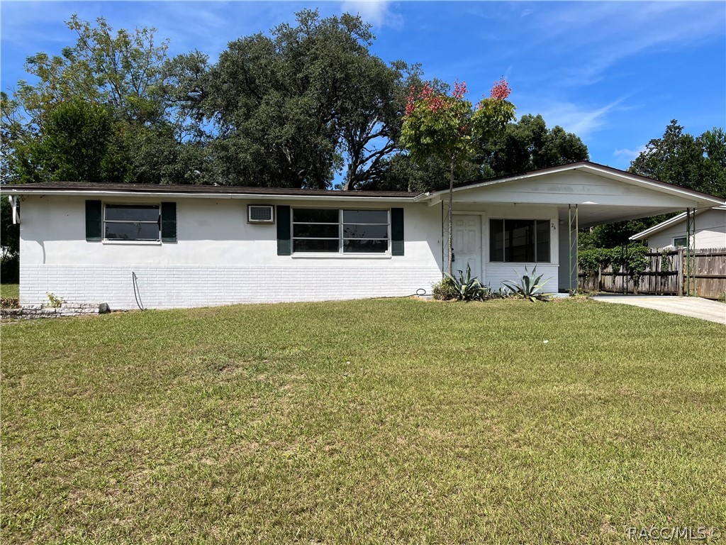 Check out this 2 bedroom home with a couple flex spaces.  There is a  small room as soon as you walk into the home that would be great for an office or playroom, an enclosed porch could make another bedroom with a little work and the HUGE laundry room could be reworked to add another bedroom/bonus room.  Roof was replaced in 2019.  With a little love and creativity this house could be a great home.