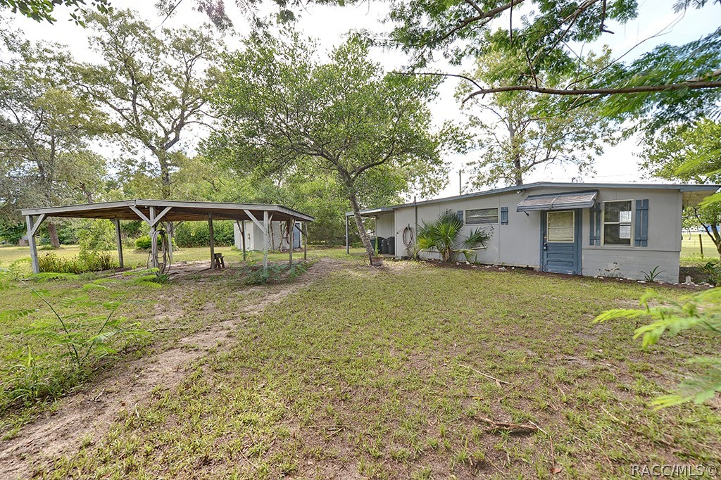 Take advantage of the endless opportunities wth this 2 bed/1 bath home on nearly an acre in Homosassa. Enjoy the privacy and convenience of this centrally located home. There are several outbuildings already in place that can be customized to your liking. Enjoy everything this area has to offer with no deed restrictions or HOA fees. There is plenty of room to set up the R.V. or park the boat. This location is just 11 miles to the Gulf of Mexico for world class fishing and Just minutes to the Suncoast parkway and​​‌​​​​‌​​‌‌​‌‌‌​​‌‌​‌‌‌​​‌‌​‌‌‌ Walmart.