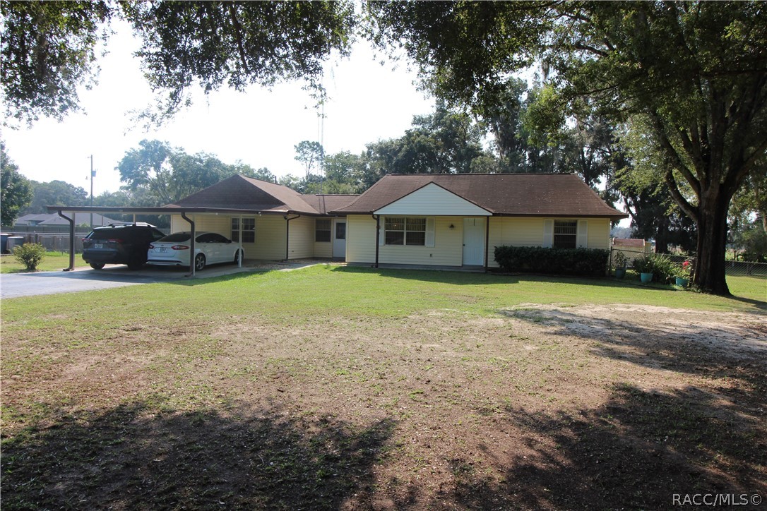 This is the place you have been looking for if you are looking for space and comfort. This 3/2 is set on a beautiful piece of property with large oaks covering it. Has a fenced back yard for your pets and the back of the property sits on a large farm track for more peace out back. Plenty of space for your toys to be parked and not be in the way on this parcel and the house will fit most anyone needs. Definitely need to take a look at this home.