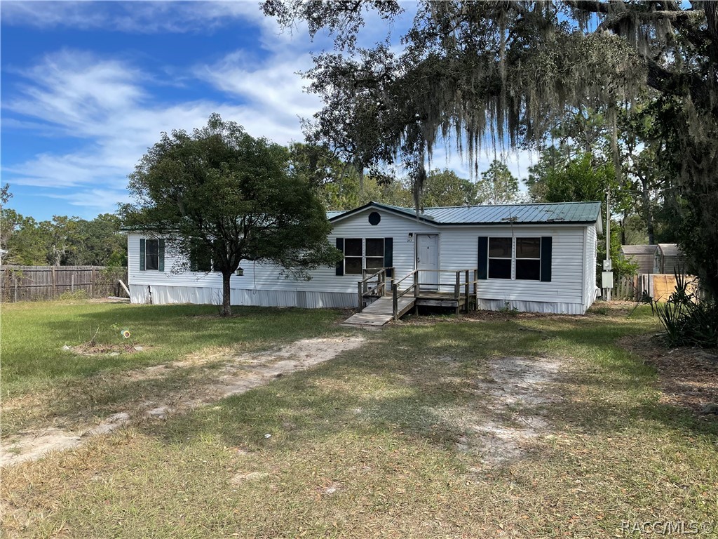 Nice 4/2 home sitting on 1.64 acres completely fenced and cross fenced.  Split floor plan with 1674 sq ft of living.  Enjoy sitting on your back porch with nothing but woods behind you, Or on those hot days, enjoy a swim in your pool.New Metal roof in 2020, new AC in 2022 along with new Septic and Drain field  and fencing out front along with new carpet and new shower tiles. Bring your Family and Toys to enjoy your new home on Easy St!!!