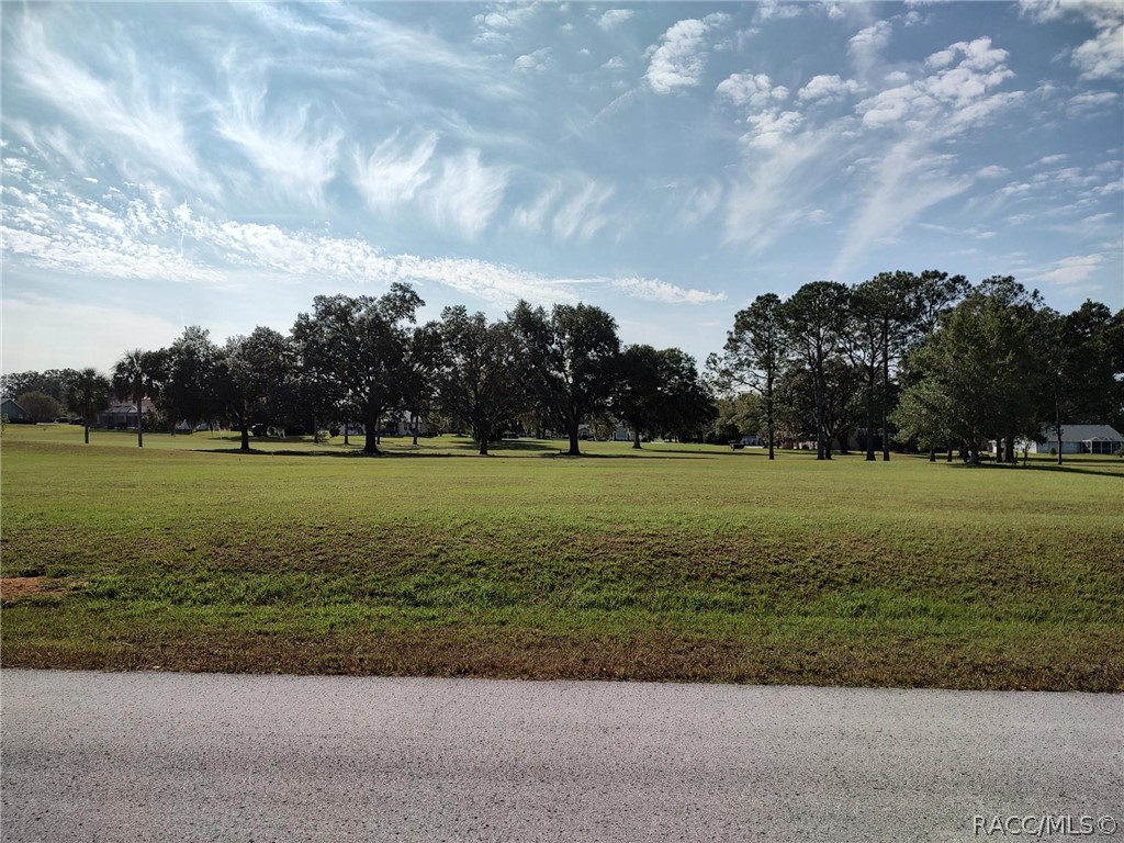 Golf course home site overlooking the 8th fairway on the Meadows Golf Course in Citrus Hills. 1/2 acre level lot with 150 feet of frontage. Build your home now or later. Perfect location with access to shopping, restaurants, medical and banking. Centrally located to Inverness, Beverly Hills, Hernando, Lecanto & Crystal River. Enjoy Citrus County for boating, fishing, diving, kayaking, golfing, swimming, parks, the 46 mile long Withlacoochee  Trail for walking, running & biking and more! Come experience the relaxed Florida lifestyle now!