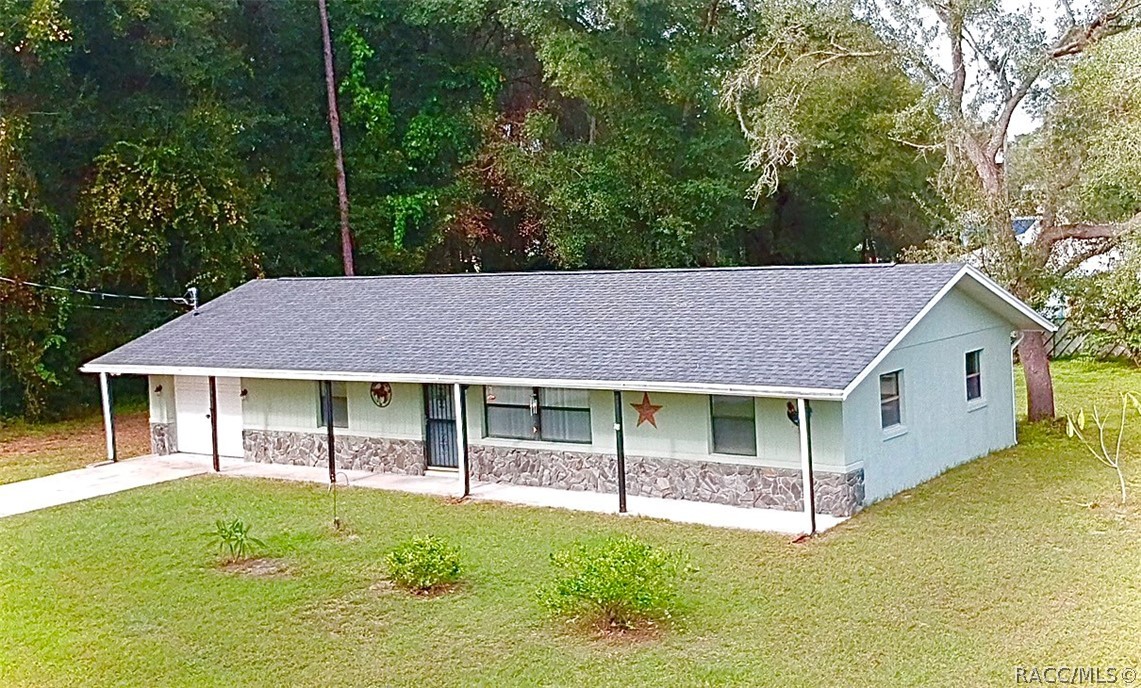 A country style home on an oversized lot with a newer roof (2019) is lucky find! The split floorplan allows everyone to come together in the nicely sized living room. If the great outdoors is for you, the home is 3 blocks away from Fort Cooper State Park and right down the street from the 46 mile Withlacoochee State Trail bike path. Less than 2 miles away is the wonderful downtown district Citrus County seat in Inverness, which has an expansive outdoor recreation area alongside the lakes, and restaurants with local flavor. In 45 minutes you're in Ocala and in 90 you're in Tampa. There's fun in every direction!