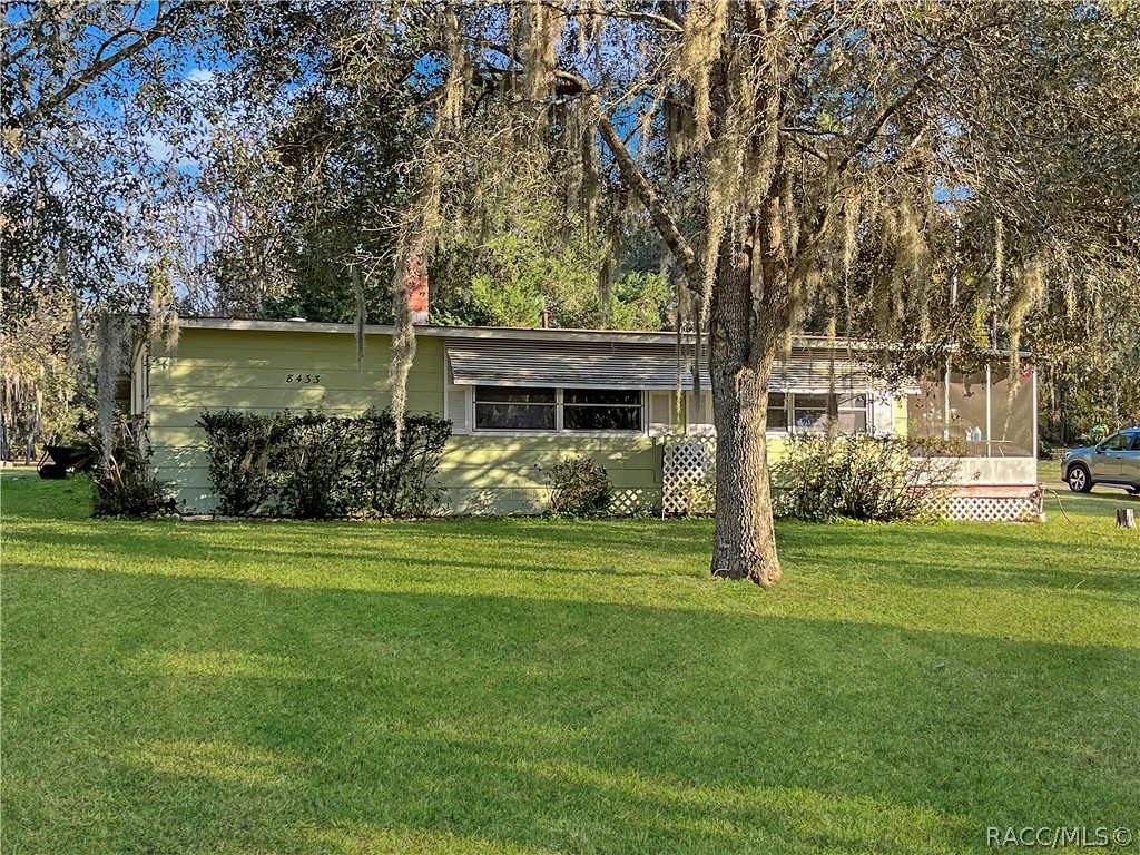 Located on over 3 beautiful acres of cleared land, this 3/1 1950's home is a must see! Concrete block home with a large carport, a cement pad for a storage/workshop located toward the back of the property, and mature fruit trees! There are no HOA fees or deed restrictions. There's Plenty of room for your boat, R/V, tractor trailer and all your toys. This home has great bones and is a blank slate for you to make your own. The property is zoned General Commercial which allows for a home-based business and general commercial business with the approval of Citrus County building division. Near the 46 mile paved Withlacoochee State trail for biking, jogging and walking with nature. A short distance to rivers and lakes for kayaking, fishing, boating and much more!
