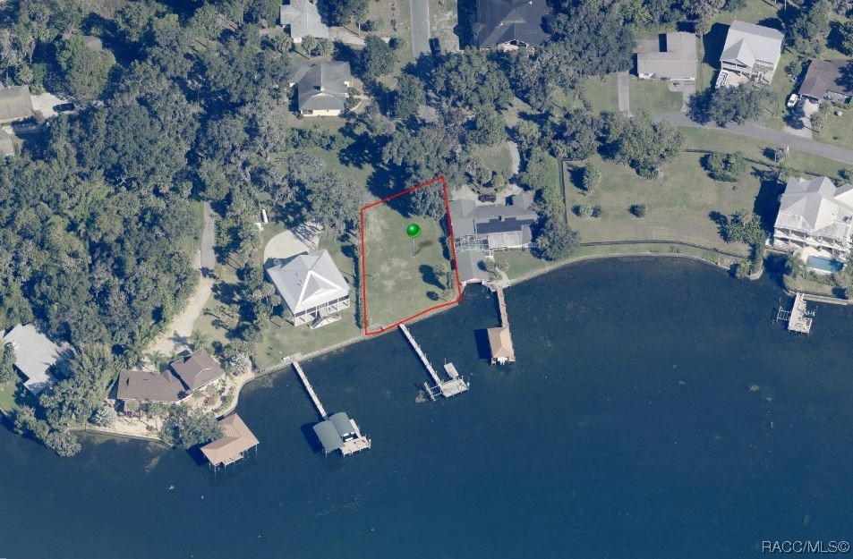 A most spectacular open waterfront lot on the Crystal River with an expansive view. Concrete seawall, survey, 100' x 155' (per county) long dock, cleared, city water and sewer. Not another lot like this one. Area of expensive homes!