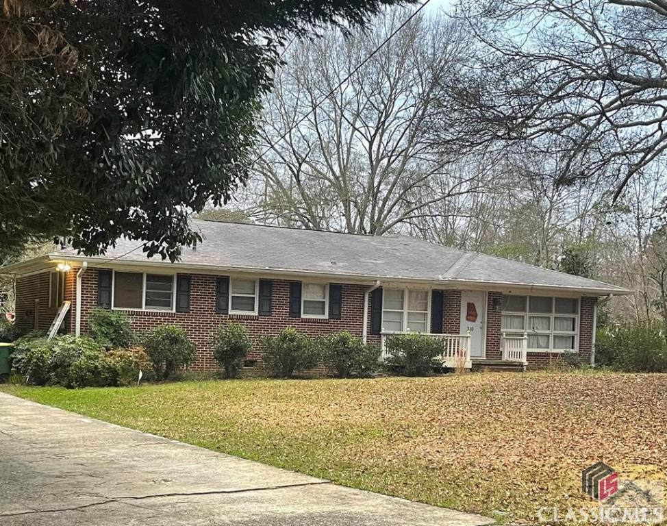 A classic brick ranch on a fantastic lot and location in Athens! 3 bedrooms with 1 full bathroom and half bath with a deck overlooking a large flat land lot.