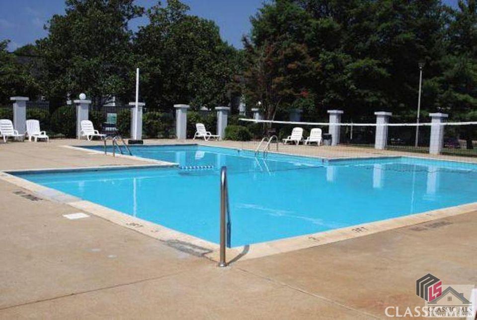 Gated community with security, volleyball courts, swimming pool, club house, tennis court, game room and lots of others. The neighborhood is adjacent to Cedar Shoals high school. Great location condo close to all East Athens shopping, dining, UGA Veterinary. Community is on bus line as well as school bus route. The association fee include WATER, trash, property insurance, and property maintenance included. New HVAC installed May 2022. This townhouse style condo features a large floor plan with 3 spacious bedrooms, 2 full bathrooms, living room, dining room, kitchen.  The current lease is $975/month, Tenant pay water and trash $100 a month,investor owned property, lease will expire July 2023.