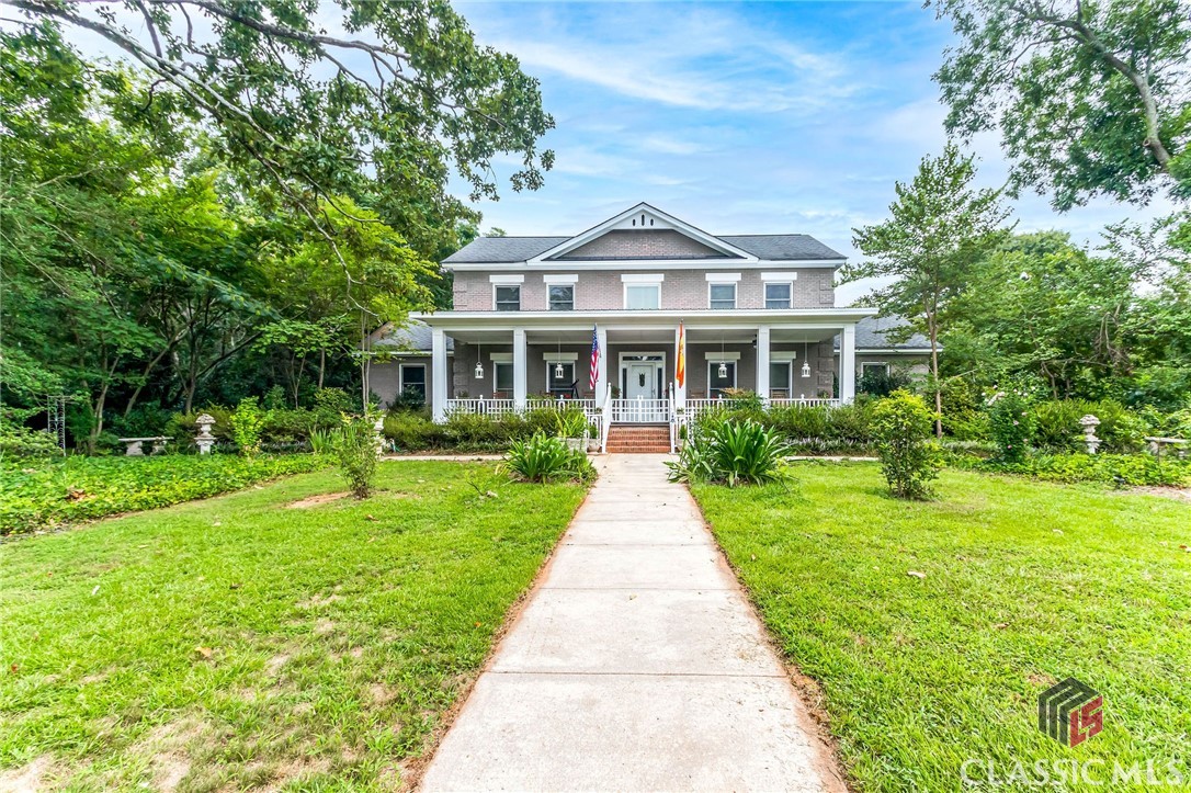 A true "Gentleman's Farm" with all the bells and whistles. This home is a rare find. Custom built 6 BR 5 1/2 BA on 6+ Acres, in-law suite w/ 2 BR, private entrance and mini kitchen. Additional detached one BR cottage w/HVAC. Barn, outbuildings, workshop, 4+ acres of pasture/fencing. 2 hot water heaters, 4 HVAC units. The home boasts huge great room, lovely hardwood floors, sunroom. lg breakfast room, pine floors, a large country kitchen w/ beautiful solid wood cabinets, butler's pantry There is more living space upstairs to include a sitting area, 3 bedrooms and 2 baths.  Show by appointment only. Call listing agent or office to set appointment to show.