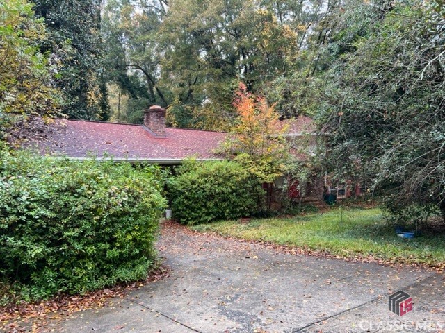 This home is situated on a large lot, at the end of one of the quietest streets in Five Points. There are mature trees on the lot which add to the privacy of the location. The location is a short walk to Milledge Avenue, Five Points and UGA.