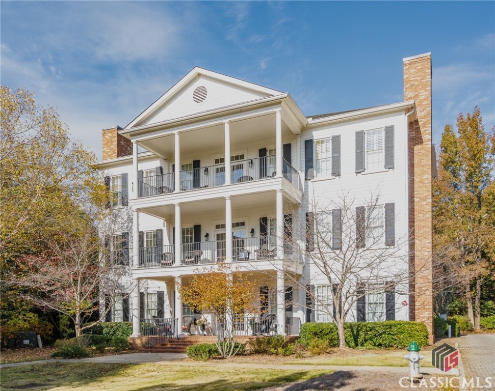 Beautiful upscale Eastside community in Ansonborough. Perfect setting for anyone looking to downsize or maybe even a first home. Or would make a great gameday weekend condo. Located just minutes from UGA, restaurants and shopping. Beautifully constructed, granite countertops in kitchen,stainless steel appliances, cherry cabinets, gas range, hidden pantry and laundry room off of kitchen, hardwood floors in living room and kitchen. Large living room with fireplace and gas logs, wide blinds throughout, guest bedroom with bath. Elevator in the building, wide front porch for evening sitting, porch furniture included, clubhouse